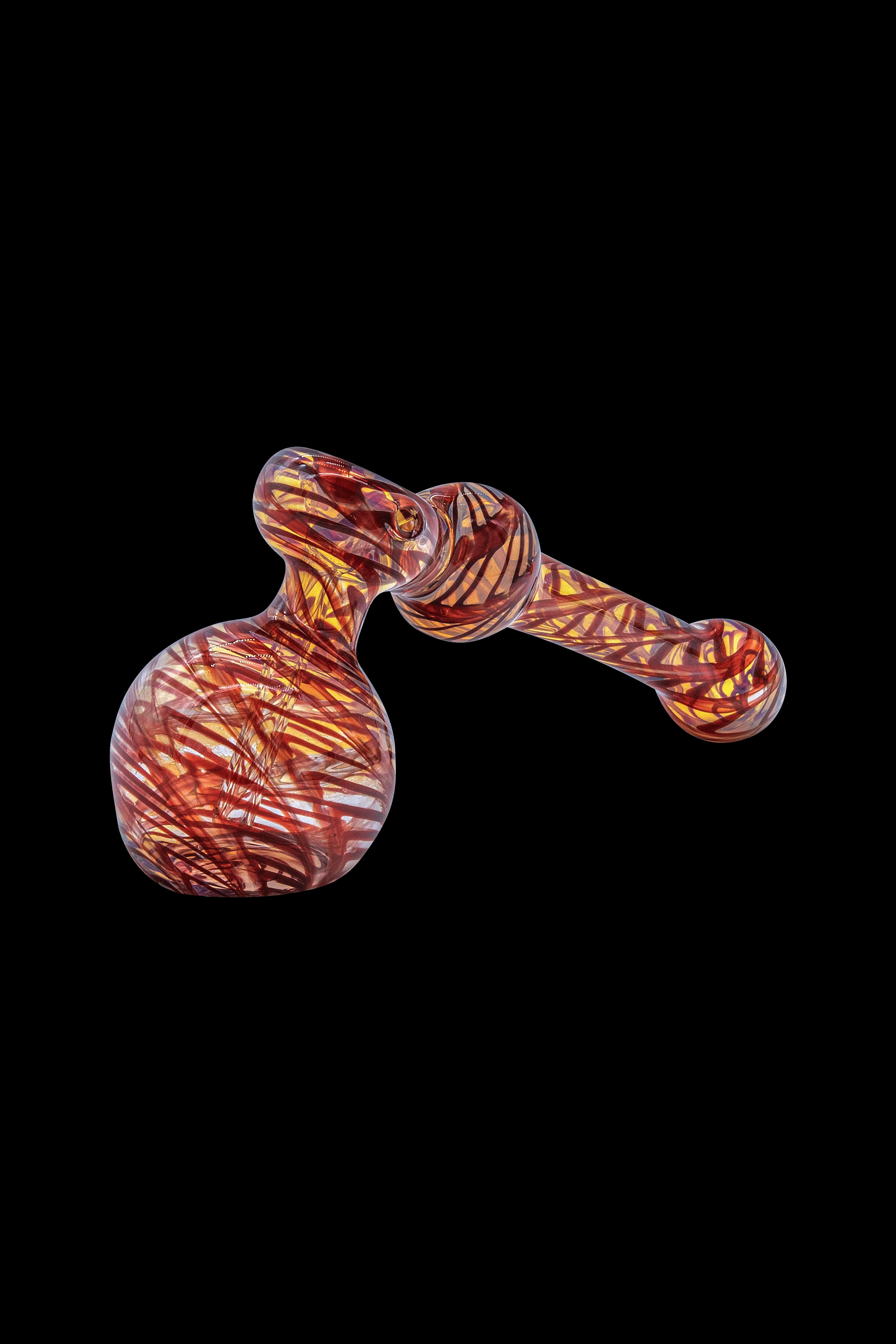 Hand-blown glass cannabis oil rig with orange and brown swirls.