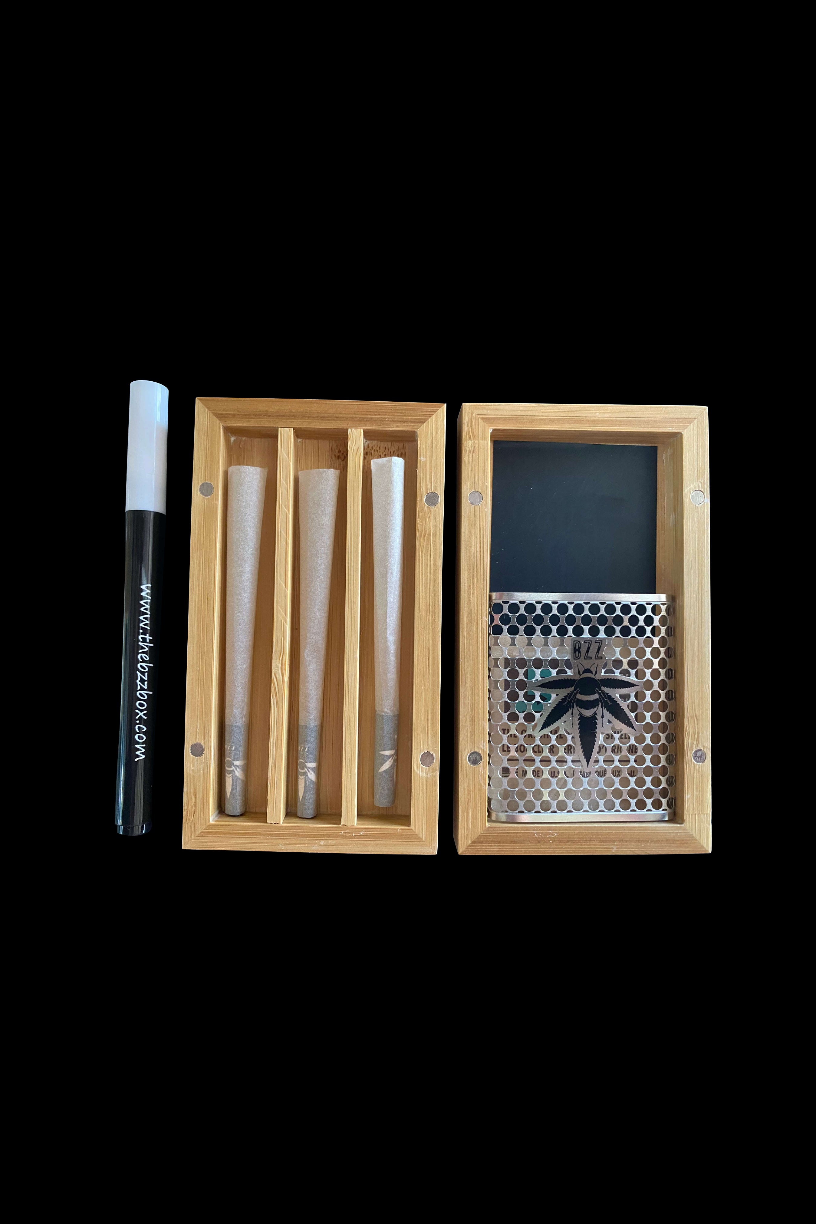 Wooden cannabis storage box open, displaying rolled joints and a honeycomb patterned compartment with a cannabis leaf design.