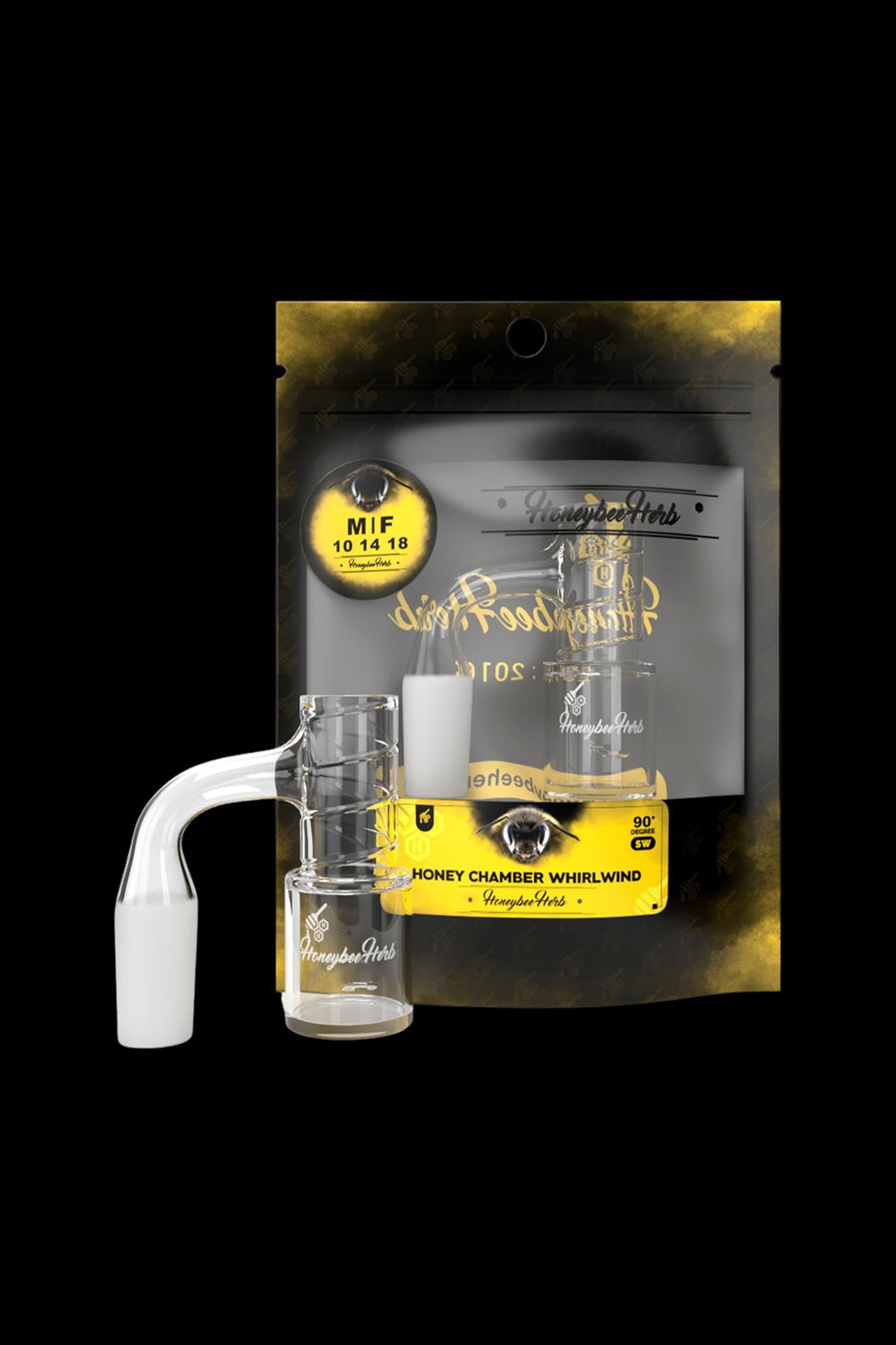 Product shot of Honeybee Herb’s cannabis concentrate and accompanying glass dab rig on a patterned black background.