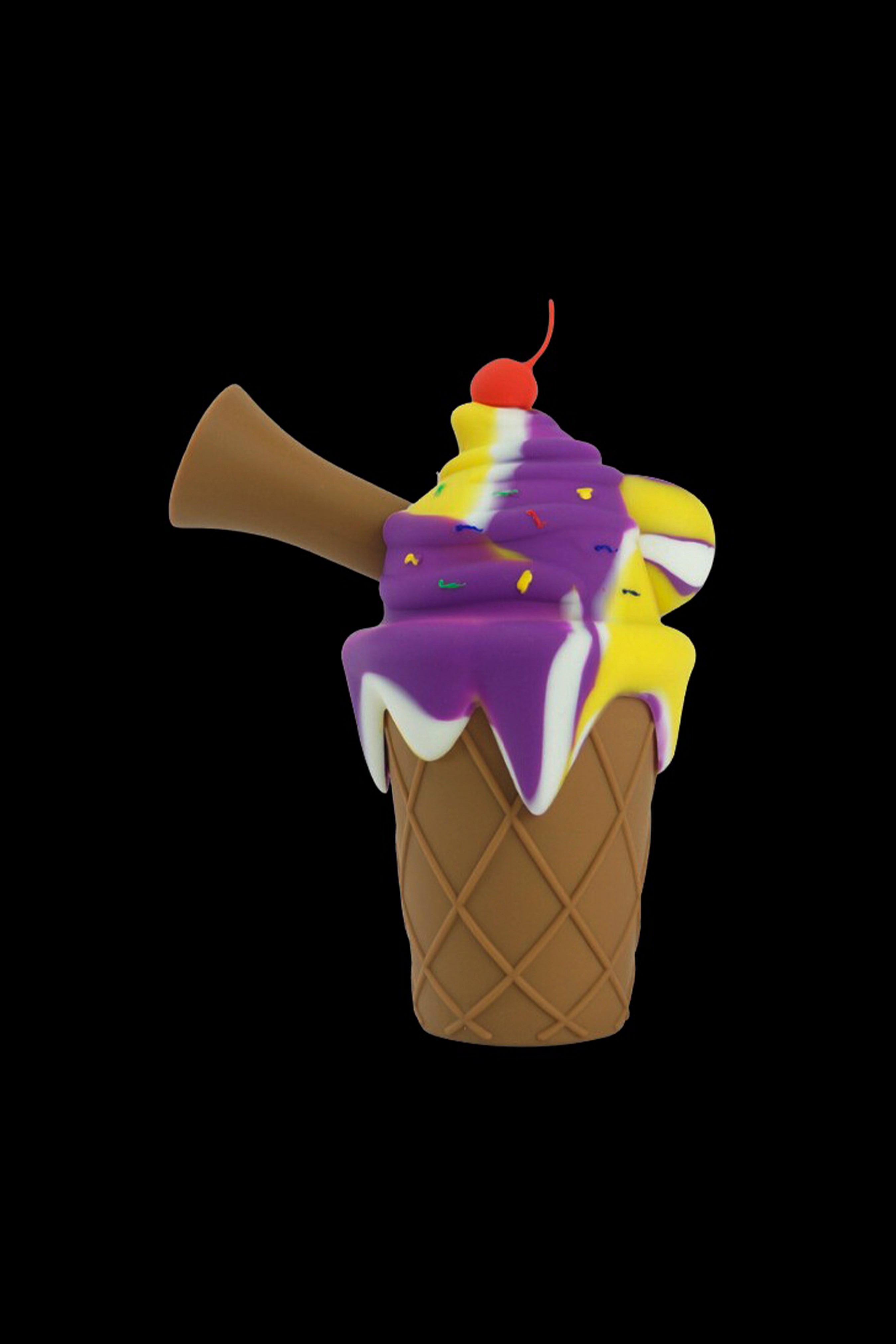 Cartoon rendering of an ice cream cone shaped cannabis water pipe with dripping purple and yellow “soft serve” and a cherry on top.
