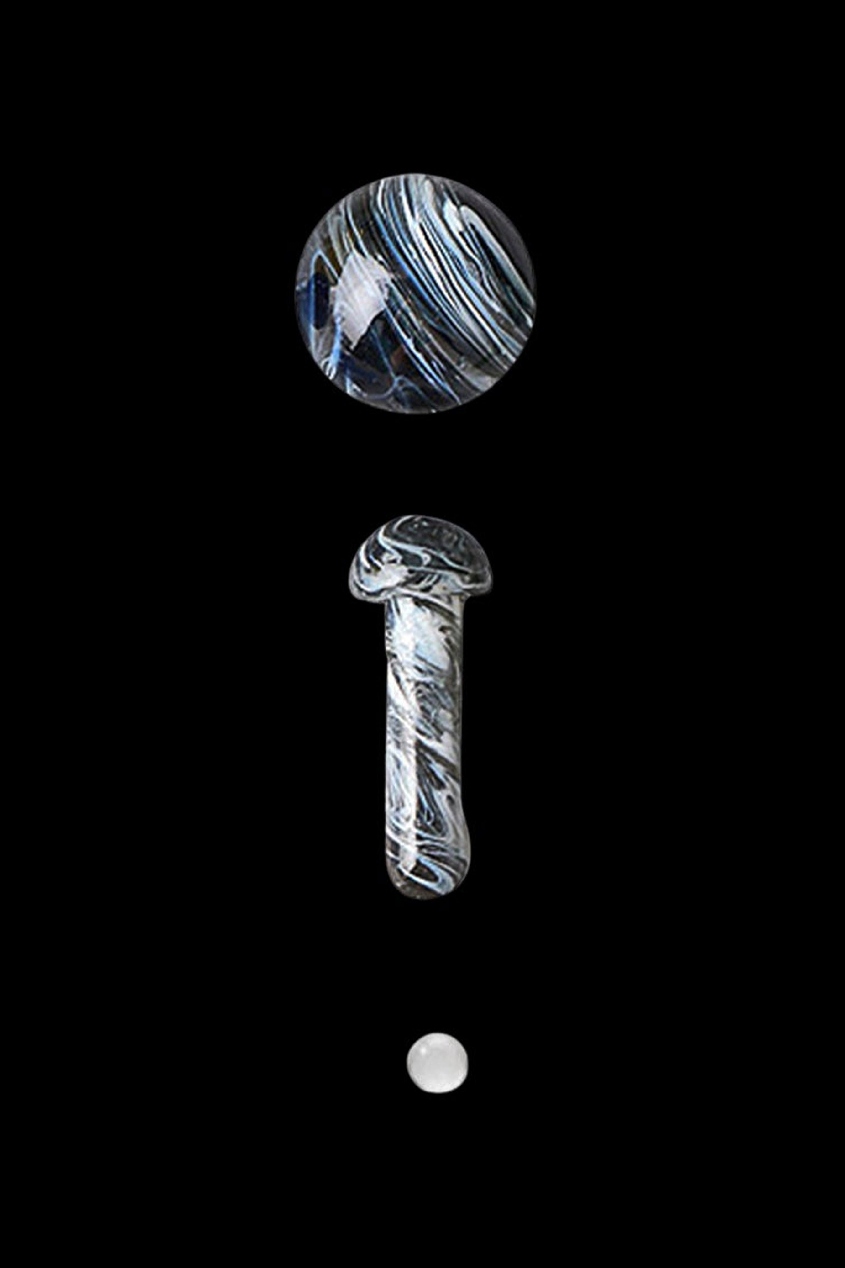 Glass cannabis oil rig components against a black background.