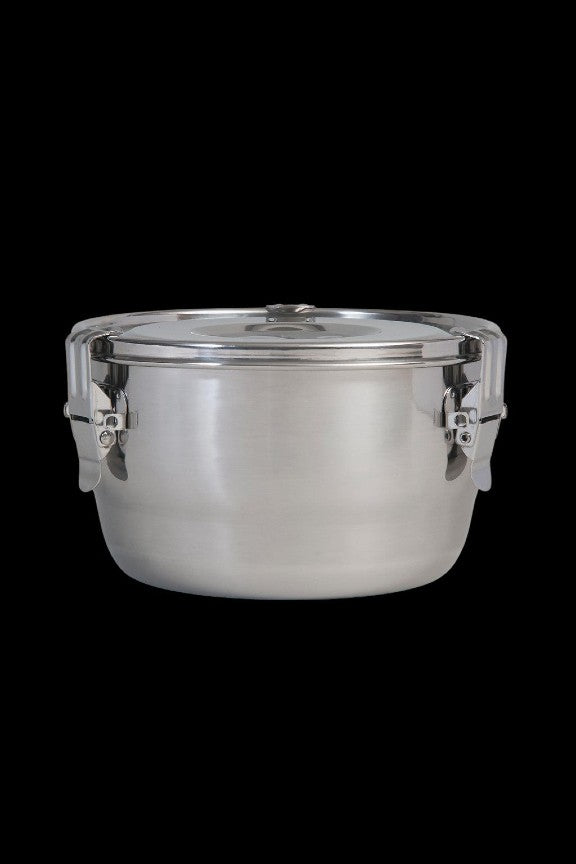 Silver airtight storage jar with metal clamps, likely for cannabis.