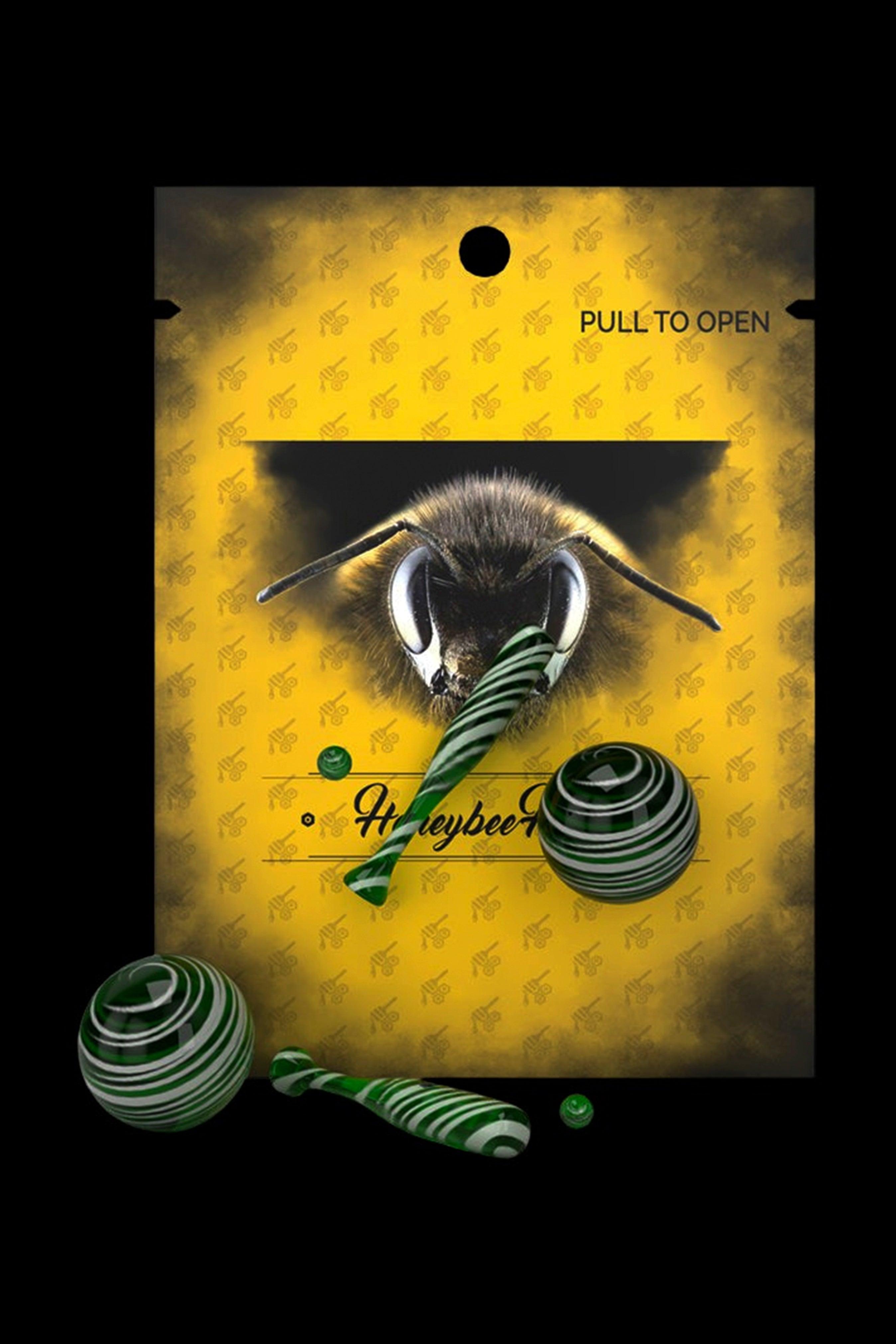 Yellow packaging for “Honeybee” cannabis accessory featuring a bee illustration and images of a green and clear glass smoking pipe. <start_of_image>