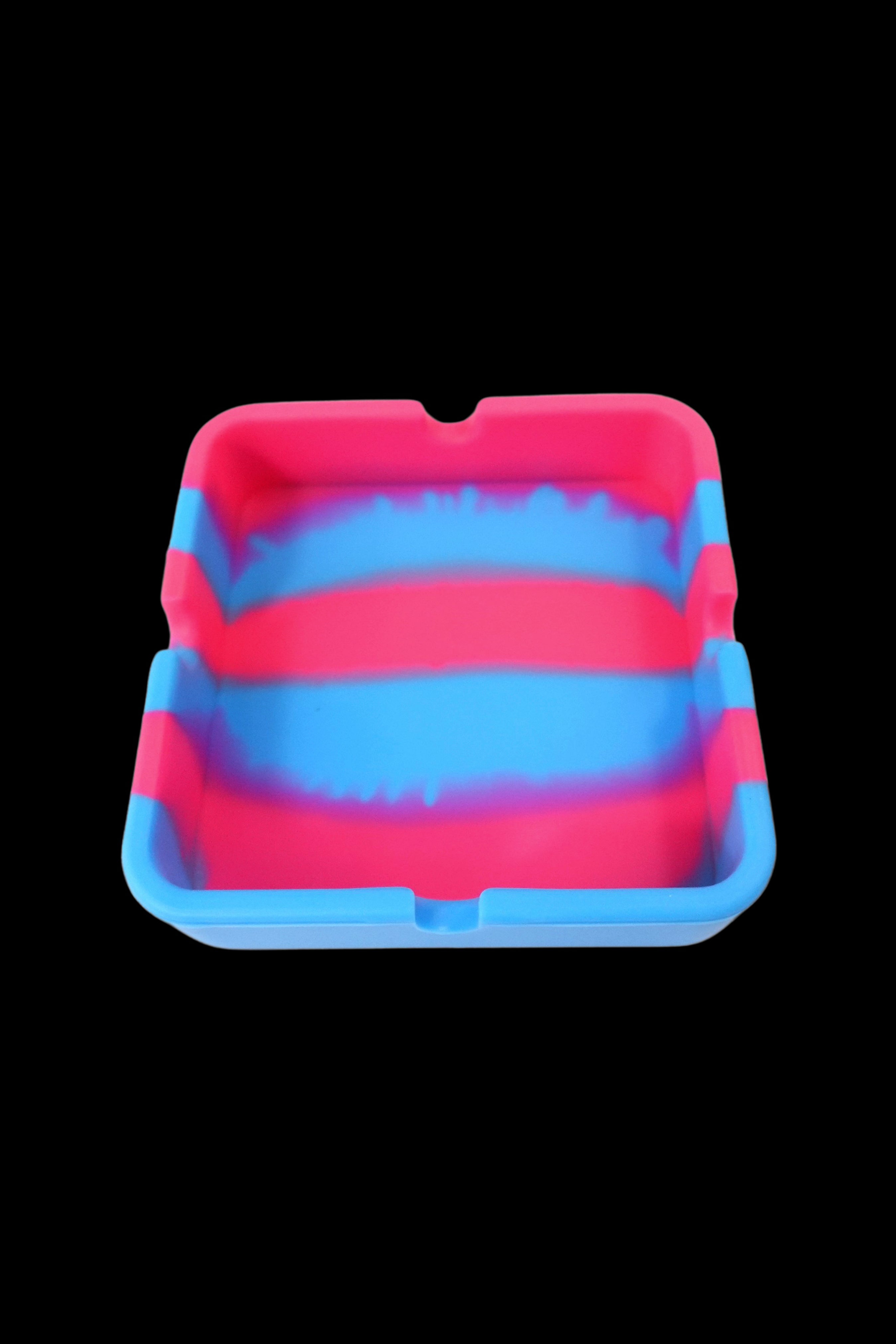 Colorful silicone catch-all tray for cannabis accessories.
