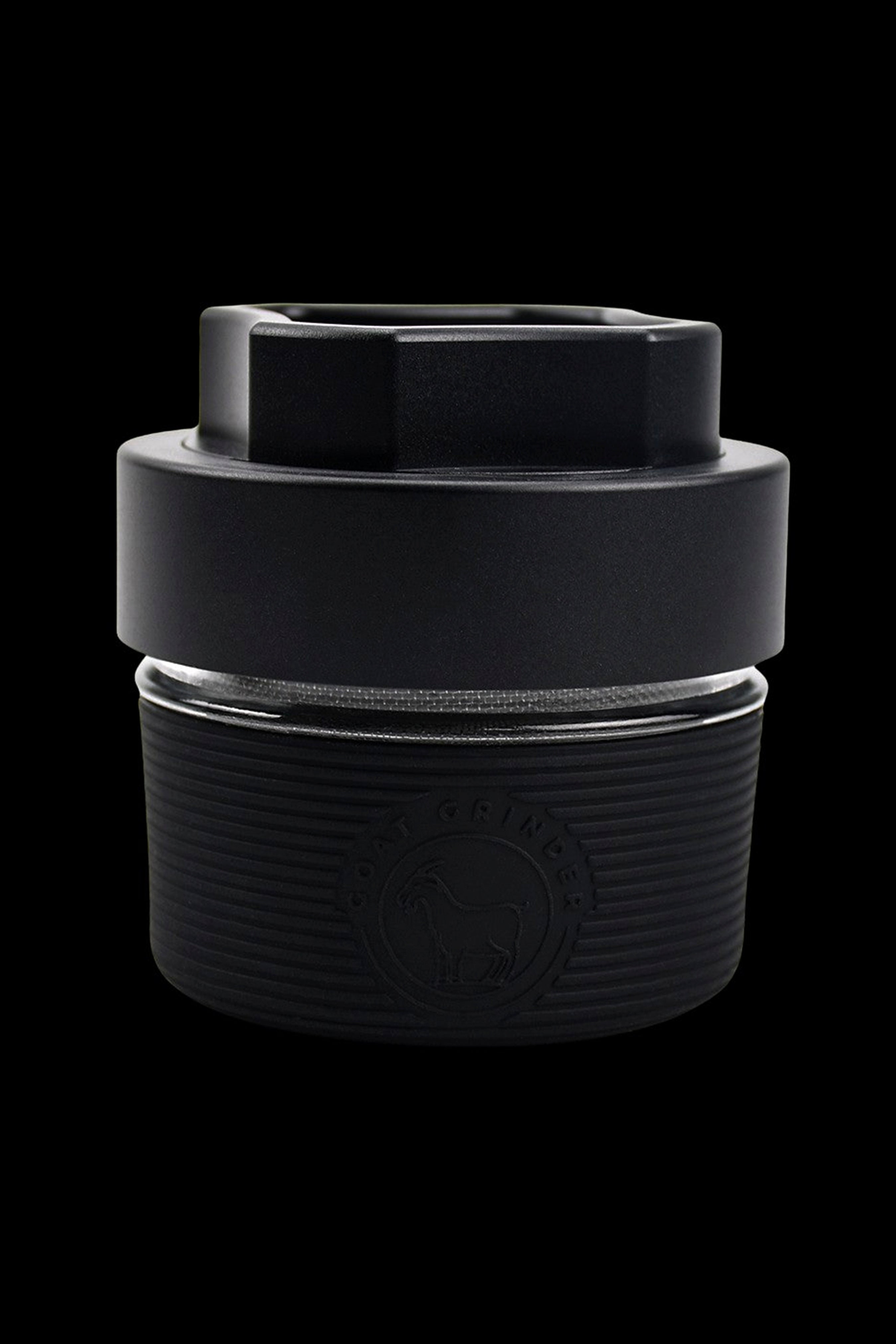 Black silicone cannabis concentrate container with embossed logo.