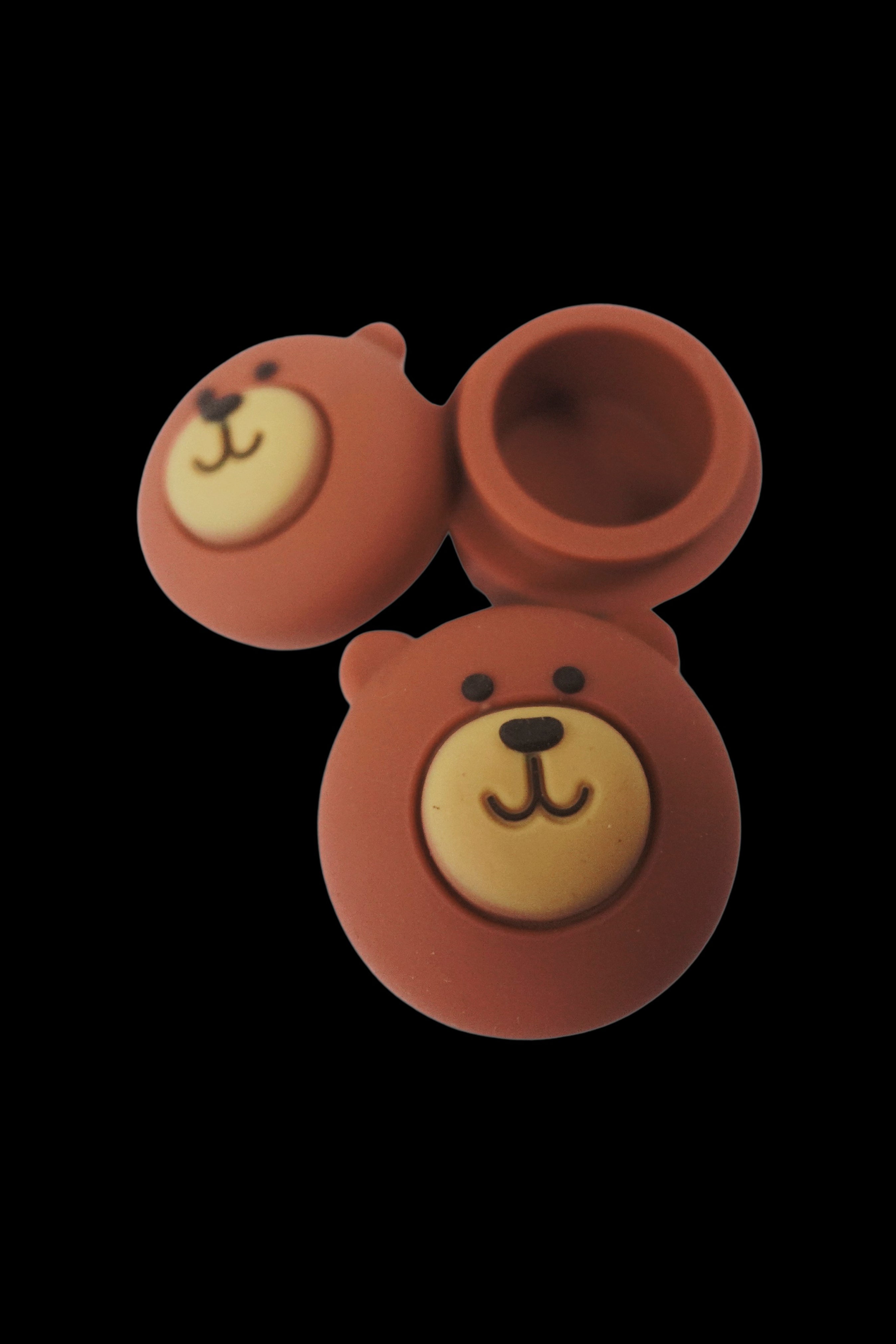 Silicone bear-shaped cannabis pipe with removable bowl.