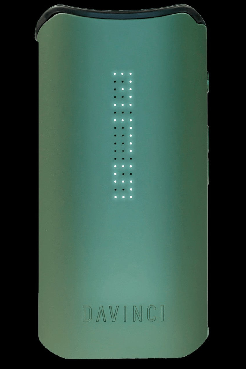 Teal DaVinci IQ2 cannabis vaporizer with illuminated indicator lights.