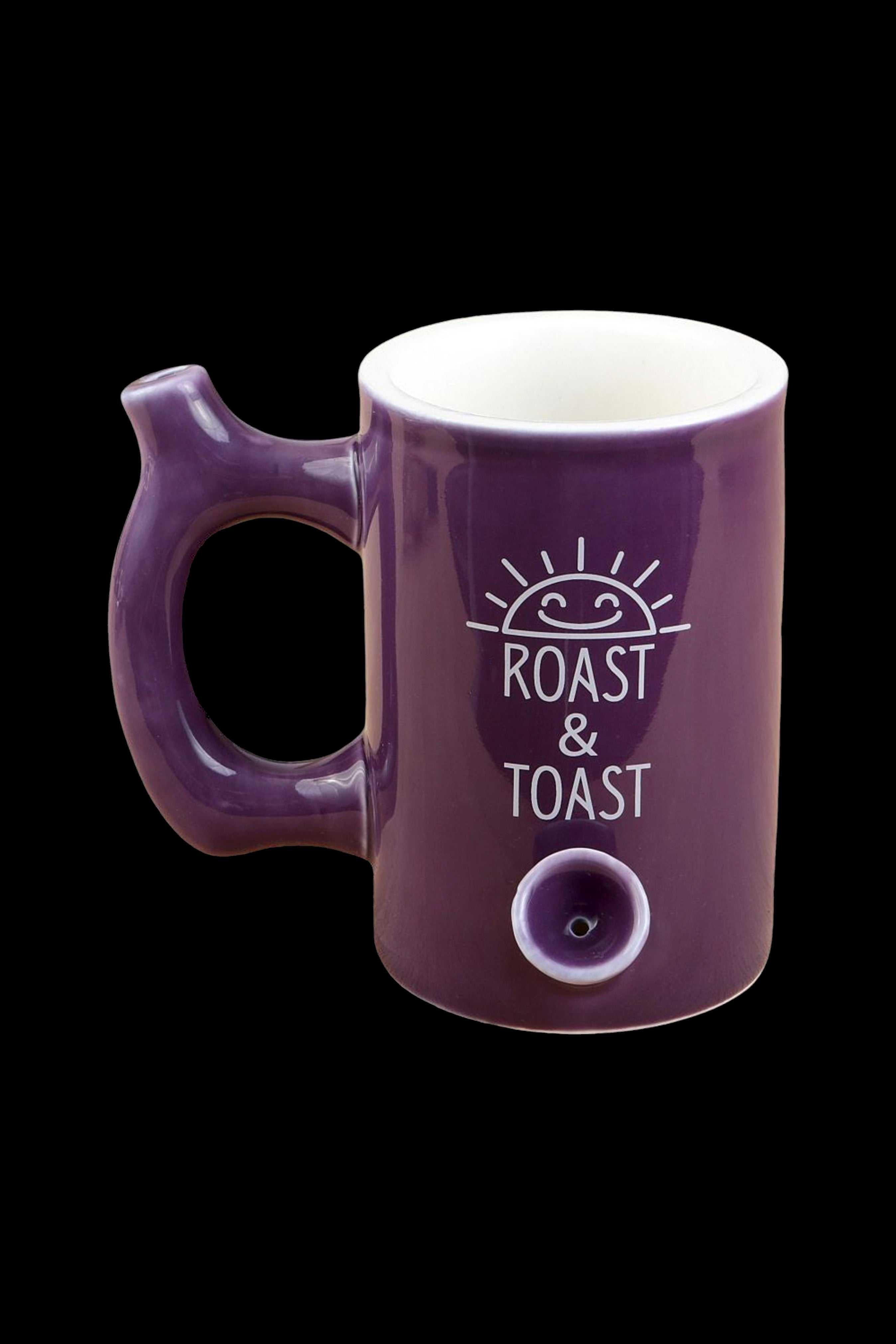 Purple electric mug with “Roast & Toast” design and power button, likely for use with cannabis consumption."