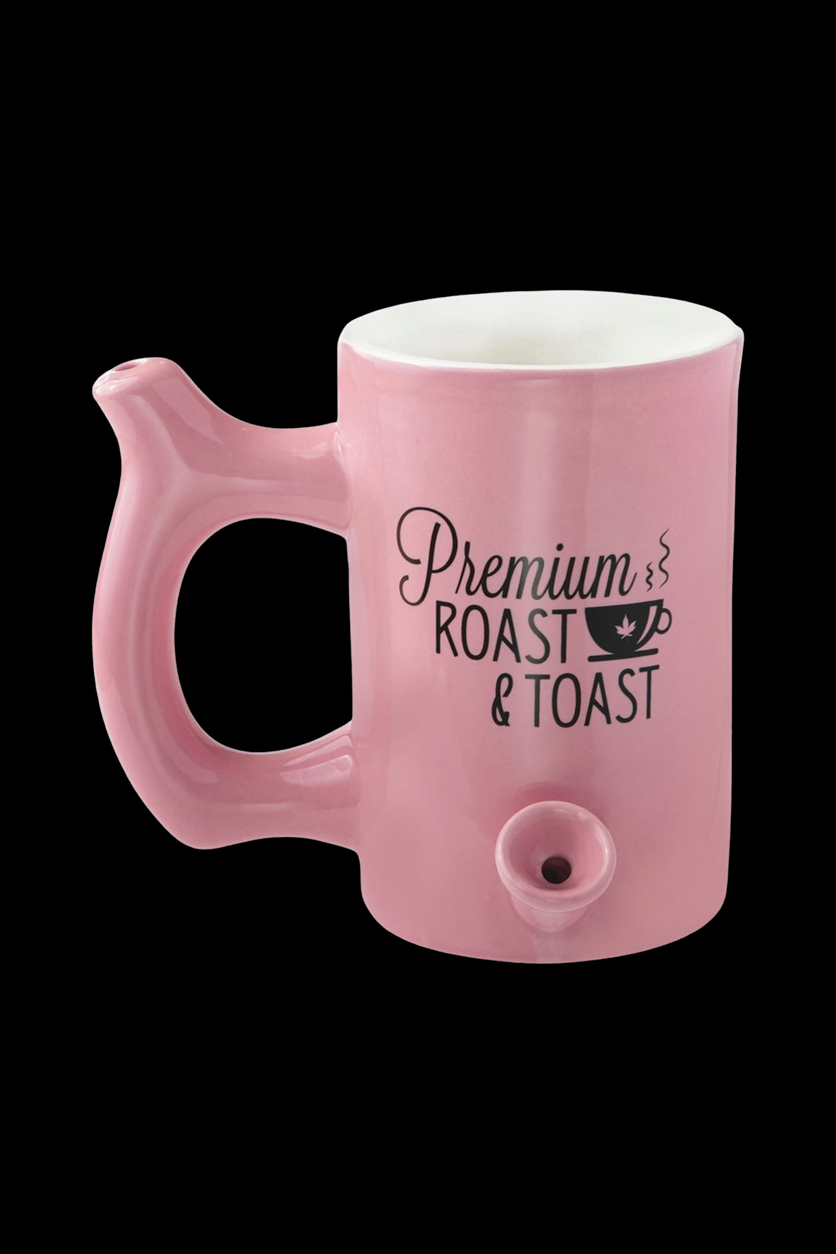 Pink ceramic mug with a built-in pipe and text reading “Premium Roast & Toast.”