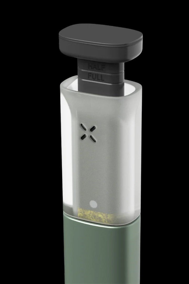 Pale green cannabis vaporizer with a dark green base.