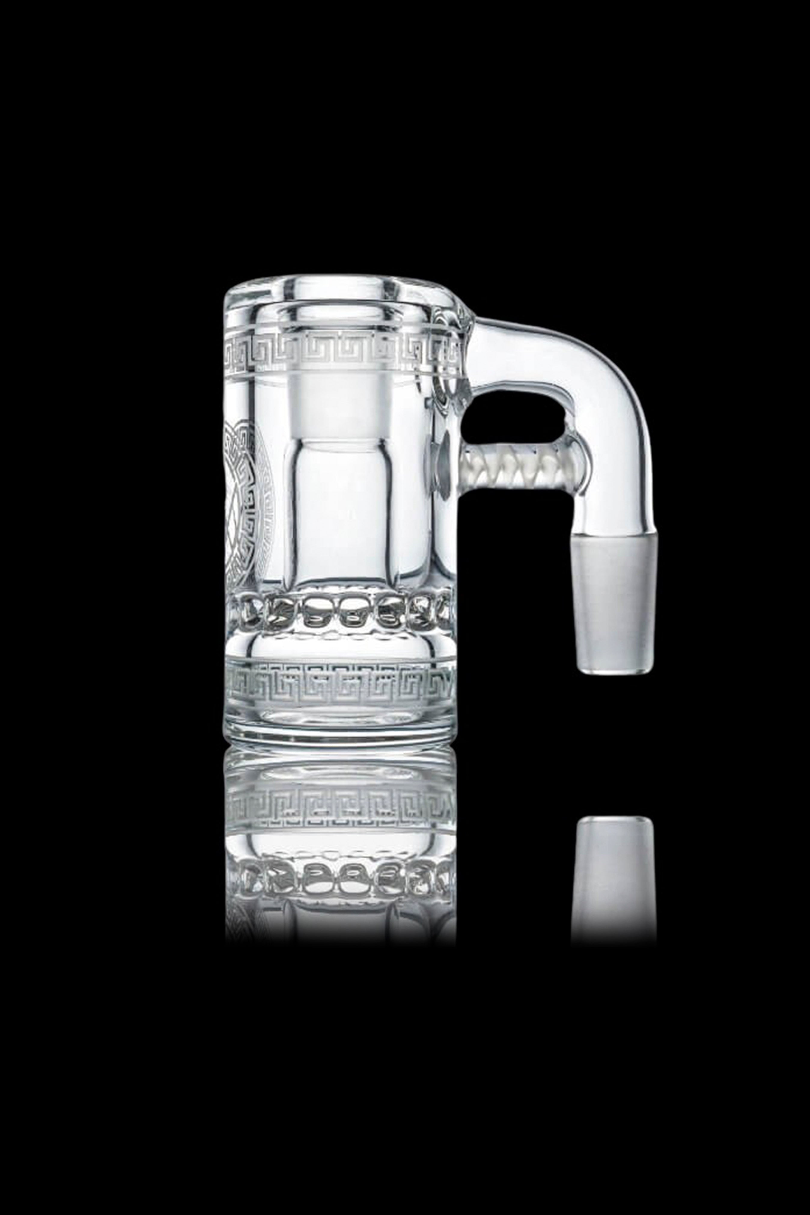 Clear glass water pipe with intricate geometric patterns.