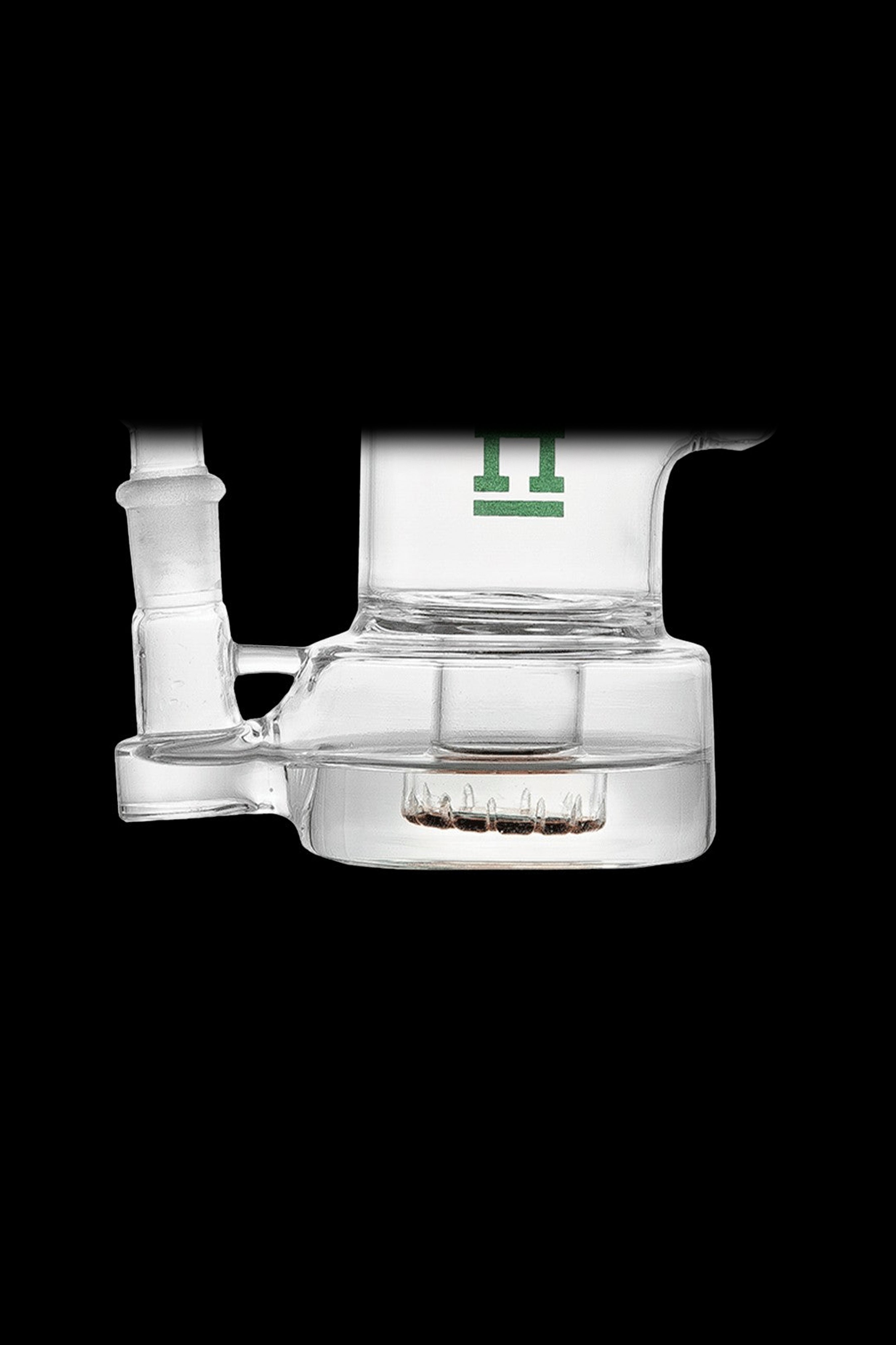 Clear glass dab rig with green logo, isolated on black.