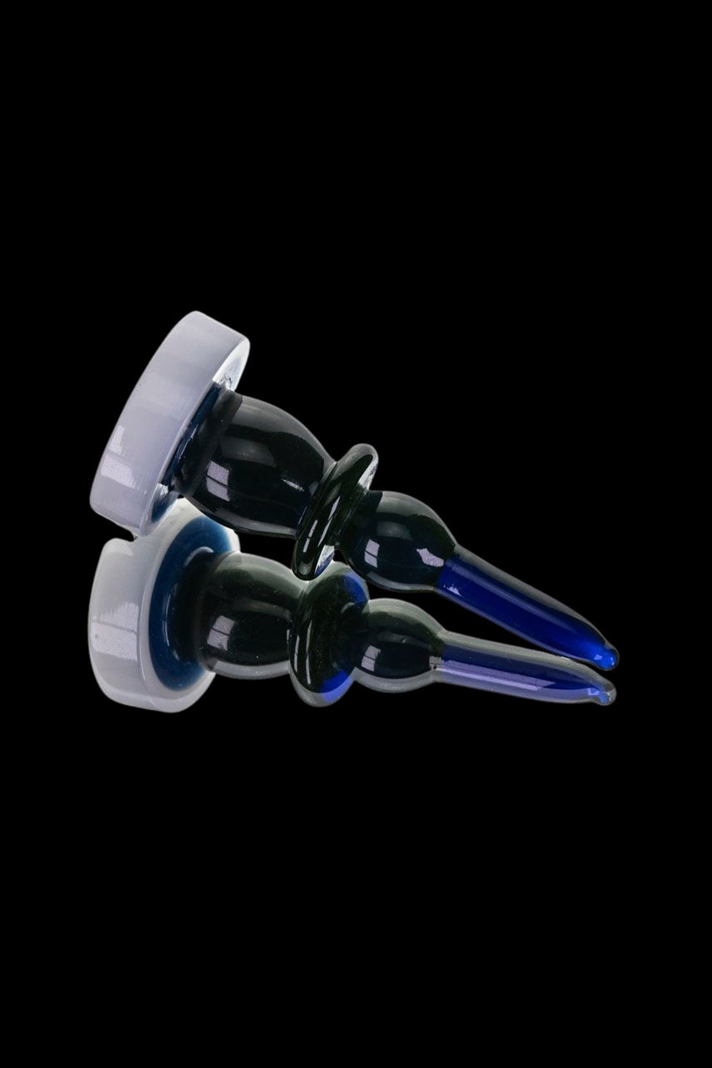 Blue and white glass oil rig dab nail with ceramic insert.