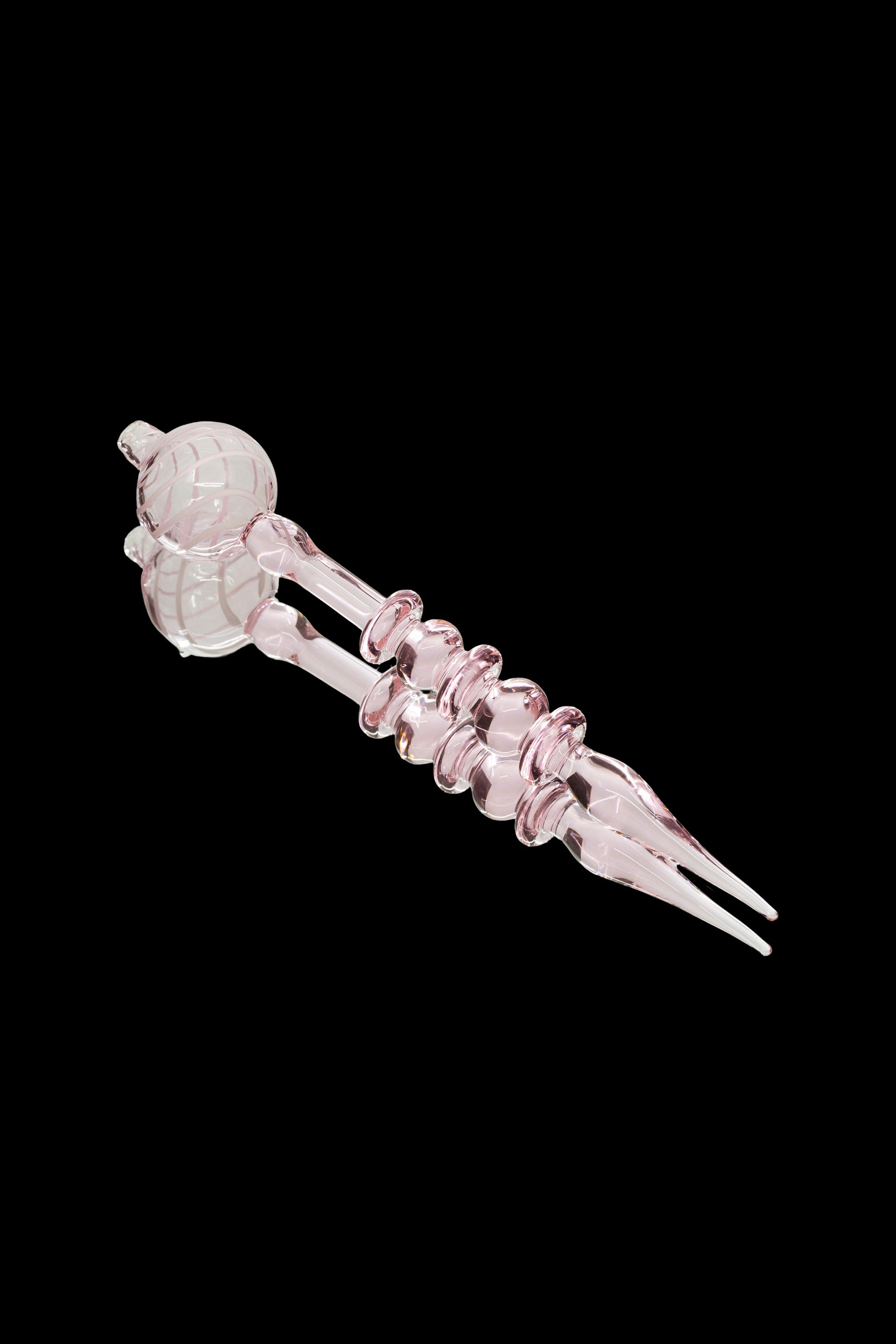 Pink glass dab tool with a spherical end and twisted shaft.