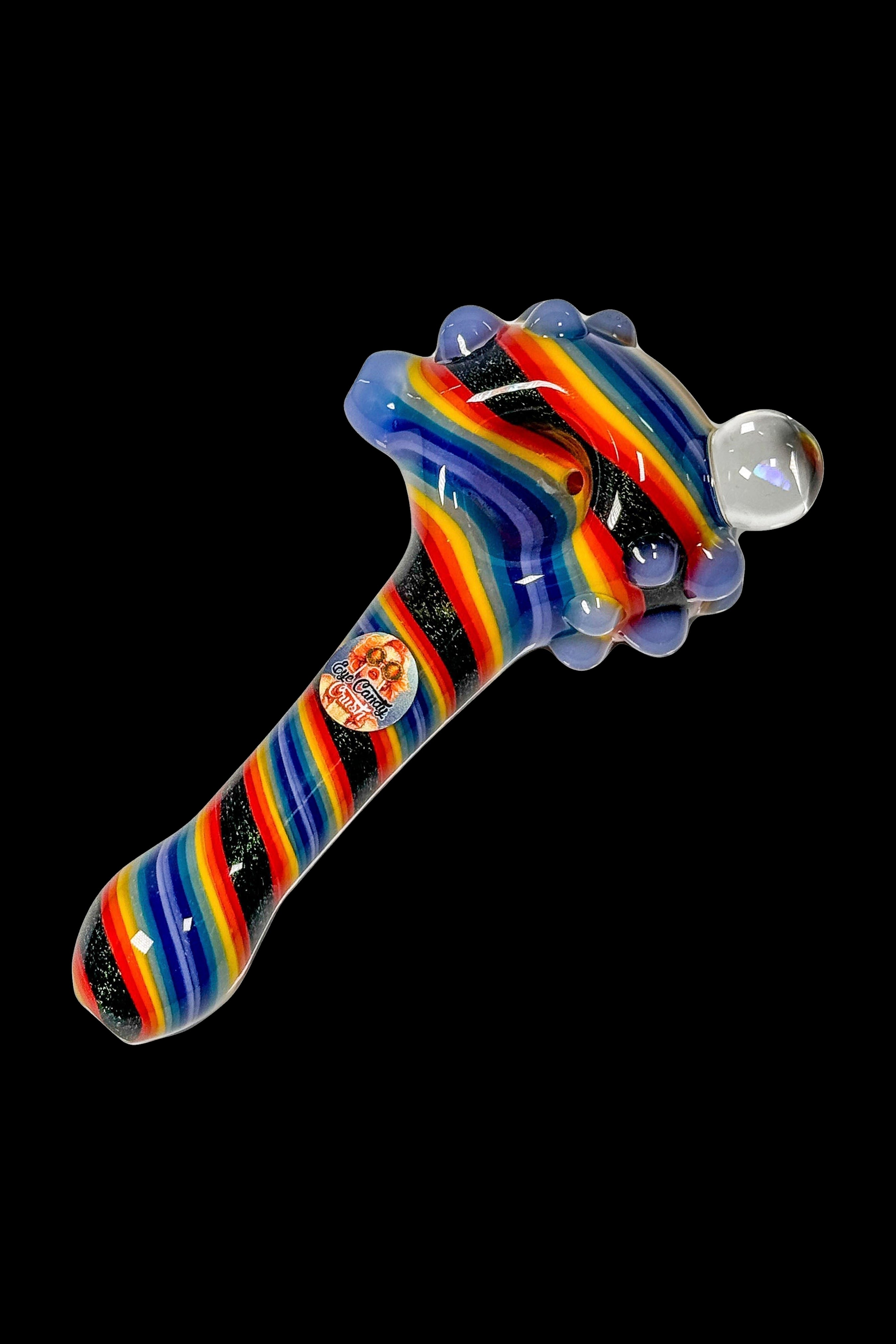 Colorful glass pipe for smoking cannabis, with a swirling rainbow pattern and clear mouthpiece.
