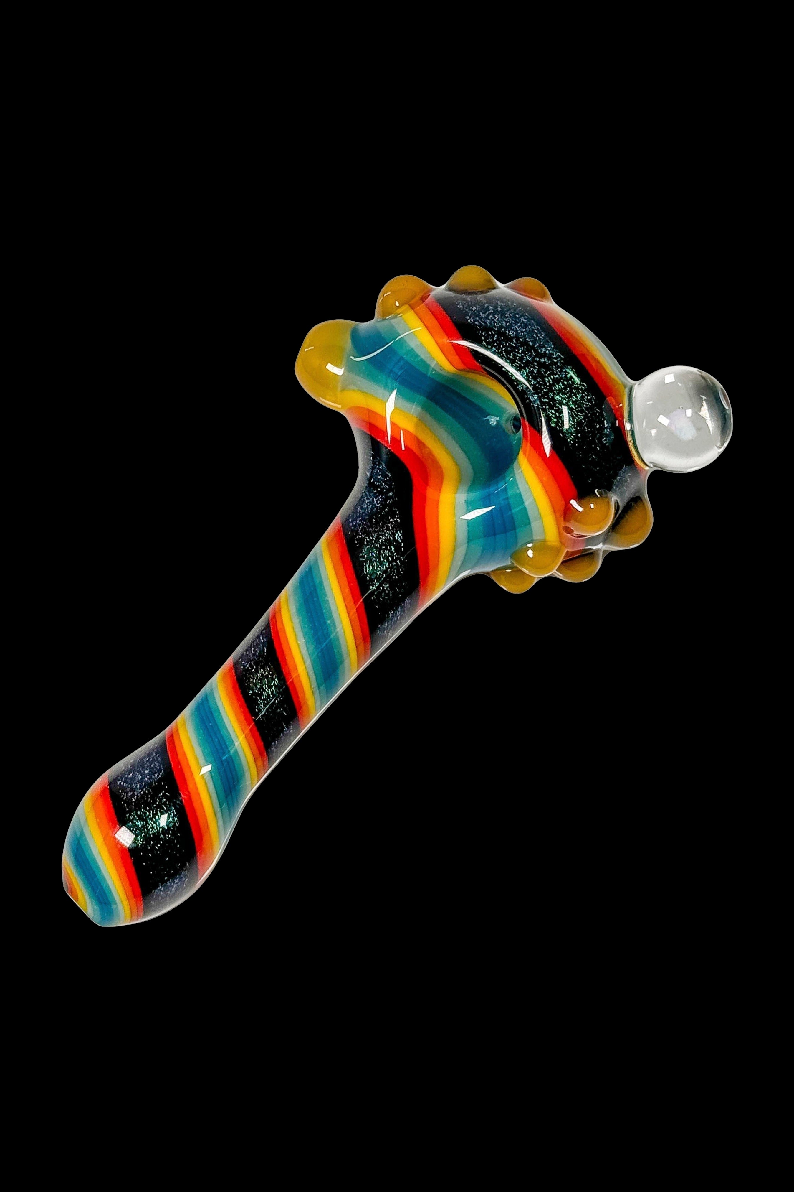 Colorful glass pipe with a clear glass bubble.