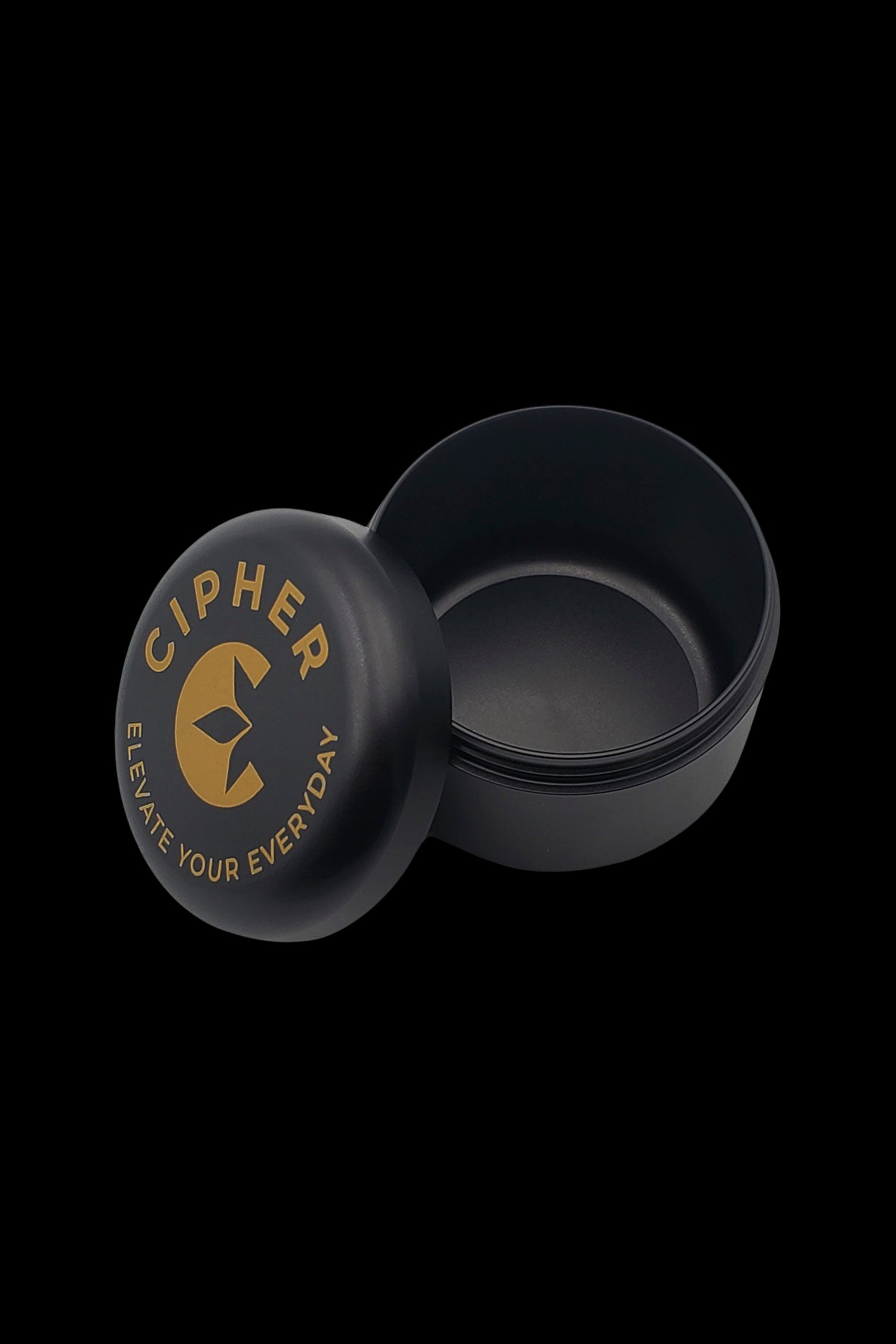 Black cannabis concentrate container with gold “Cipher” branding.
