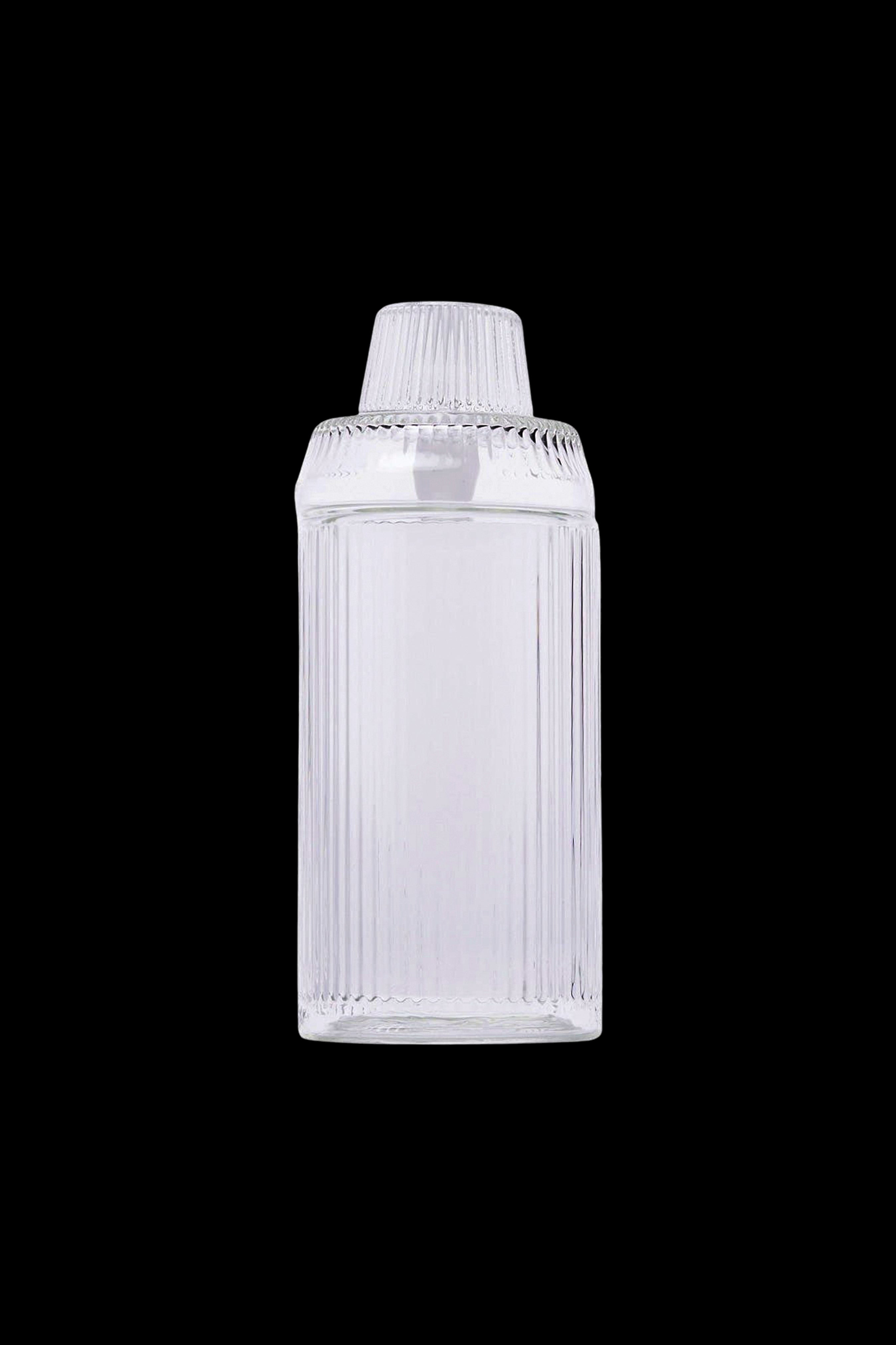 Clear glass cannabis oil container.