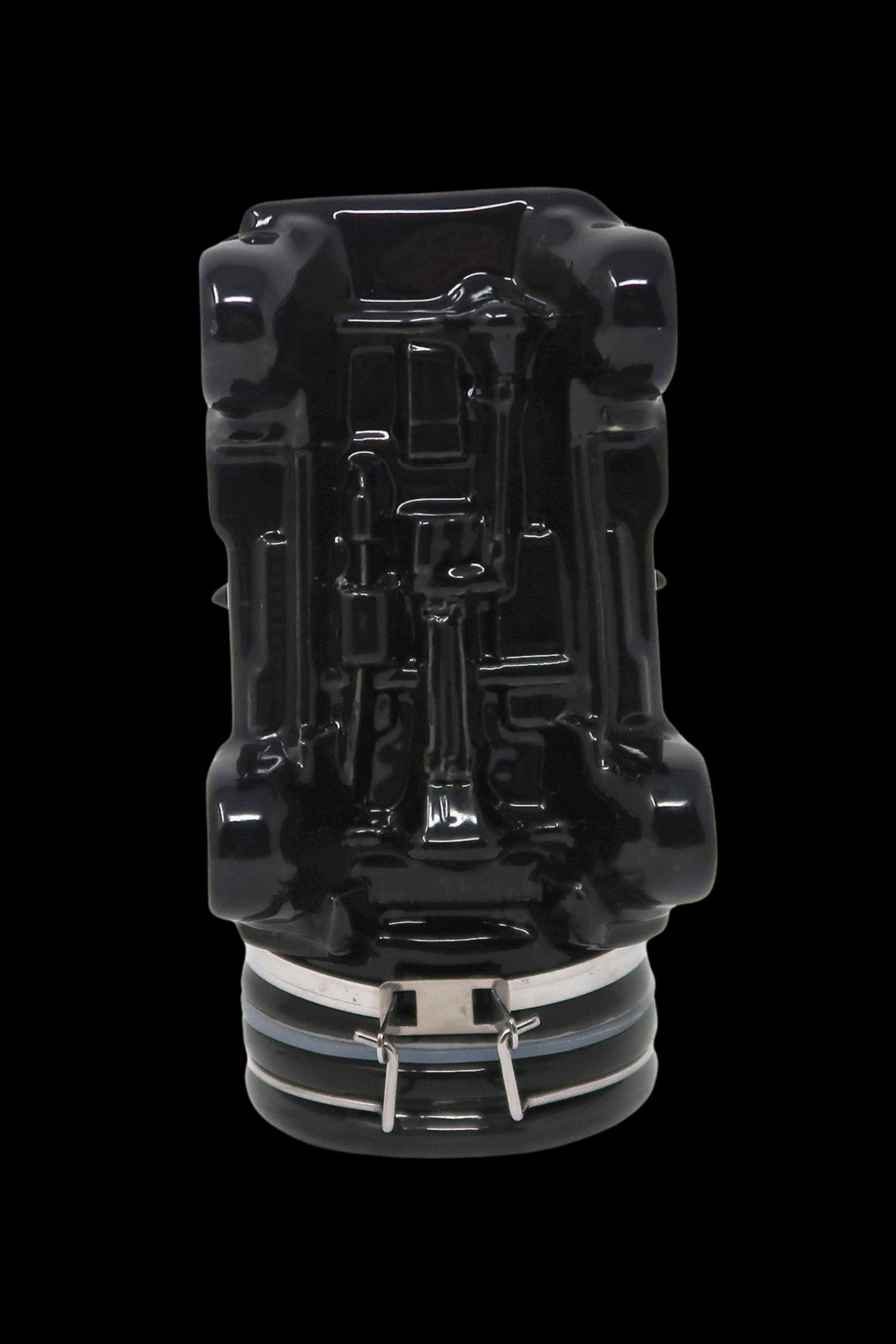 Black glass water pipe with intricate percolator design.