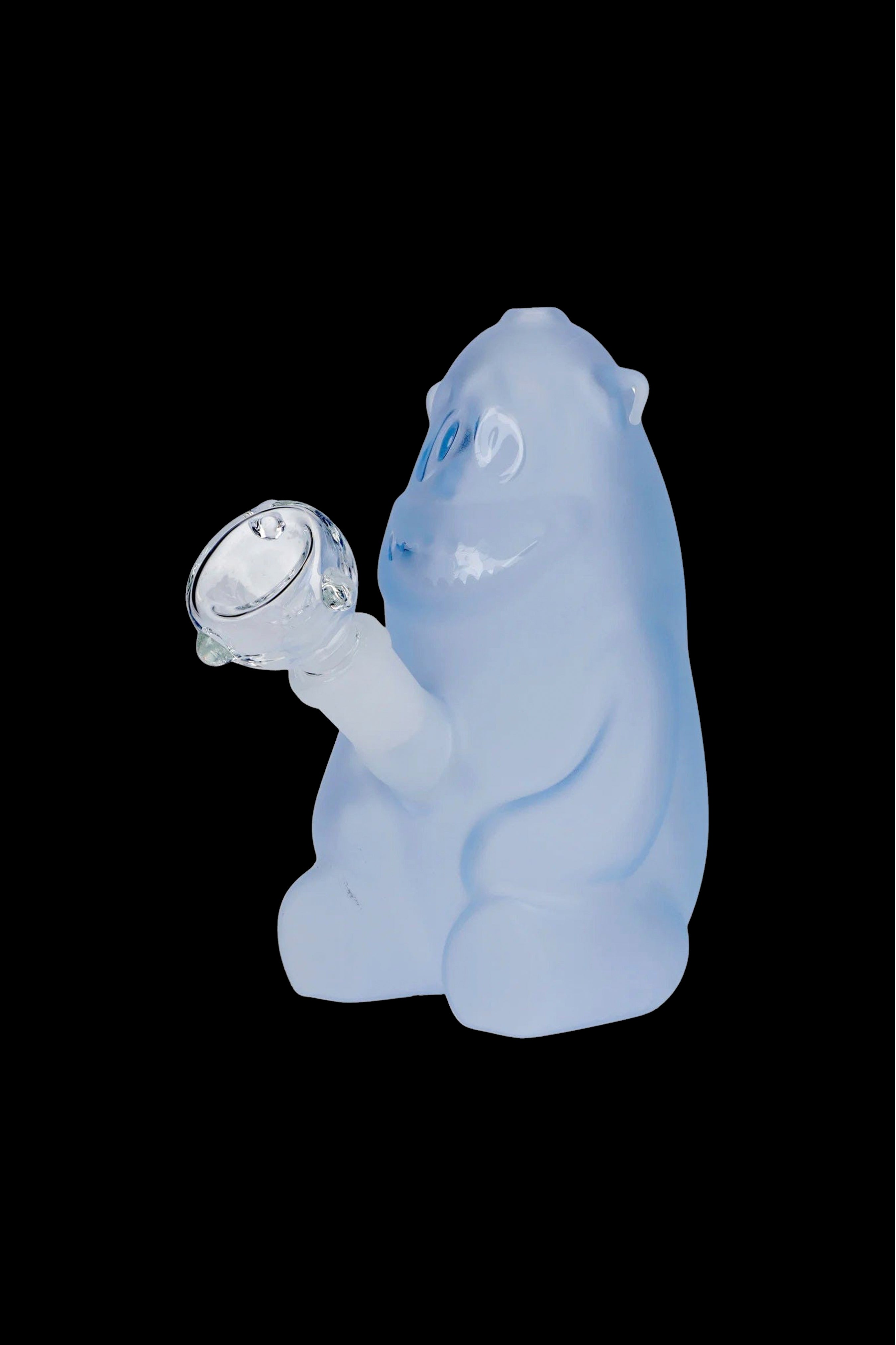 Blue glass sculpture of a gorilla holding a cannabis bowl.