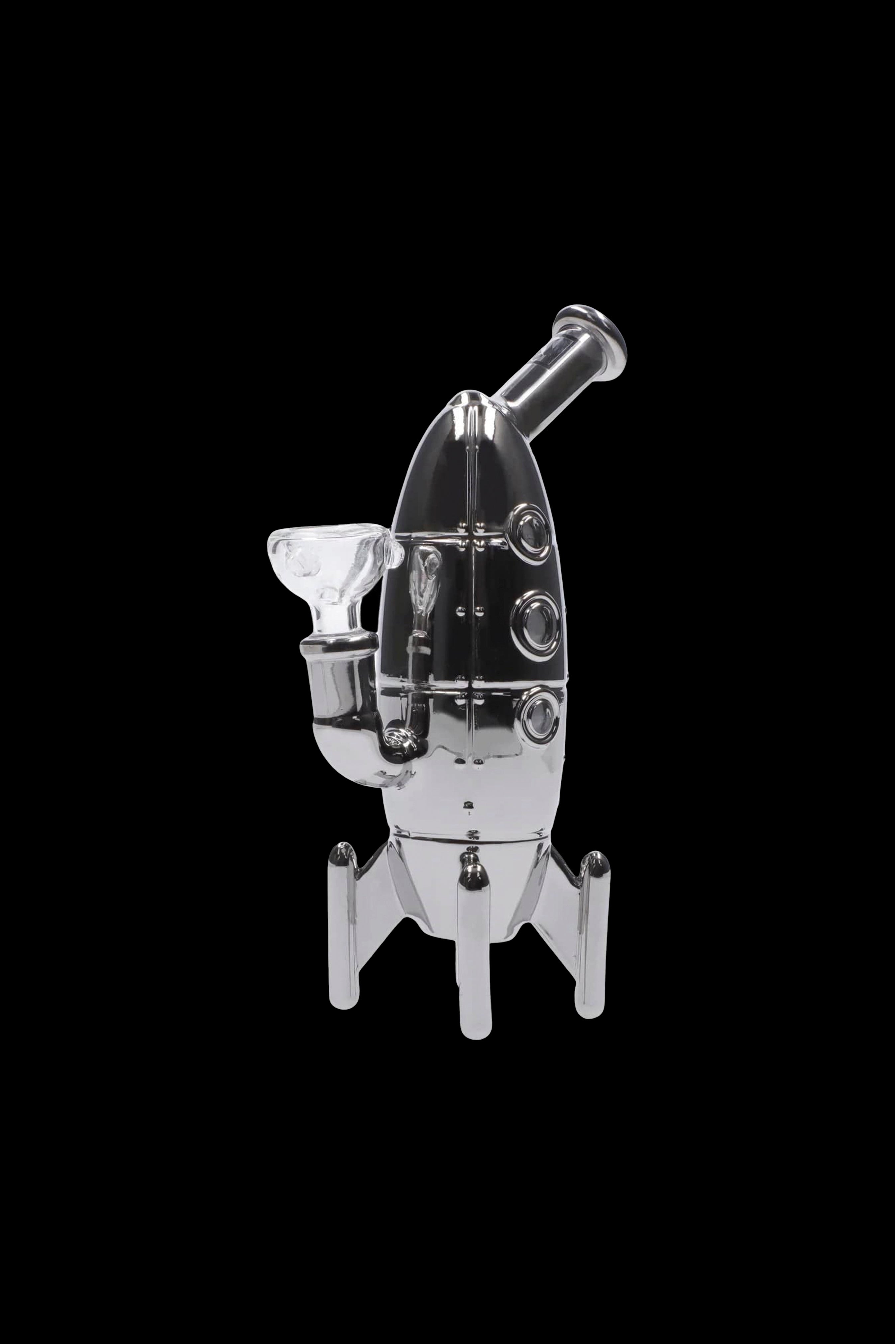 Clear glass rocket ship-shaped dab rig against a black background.