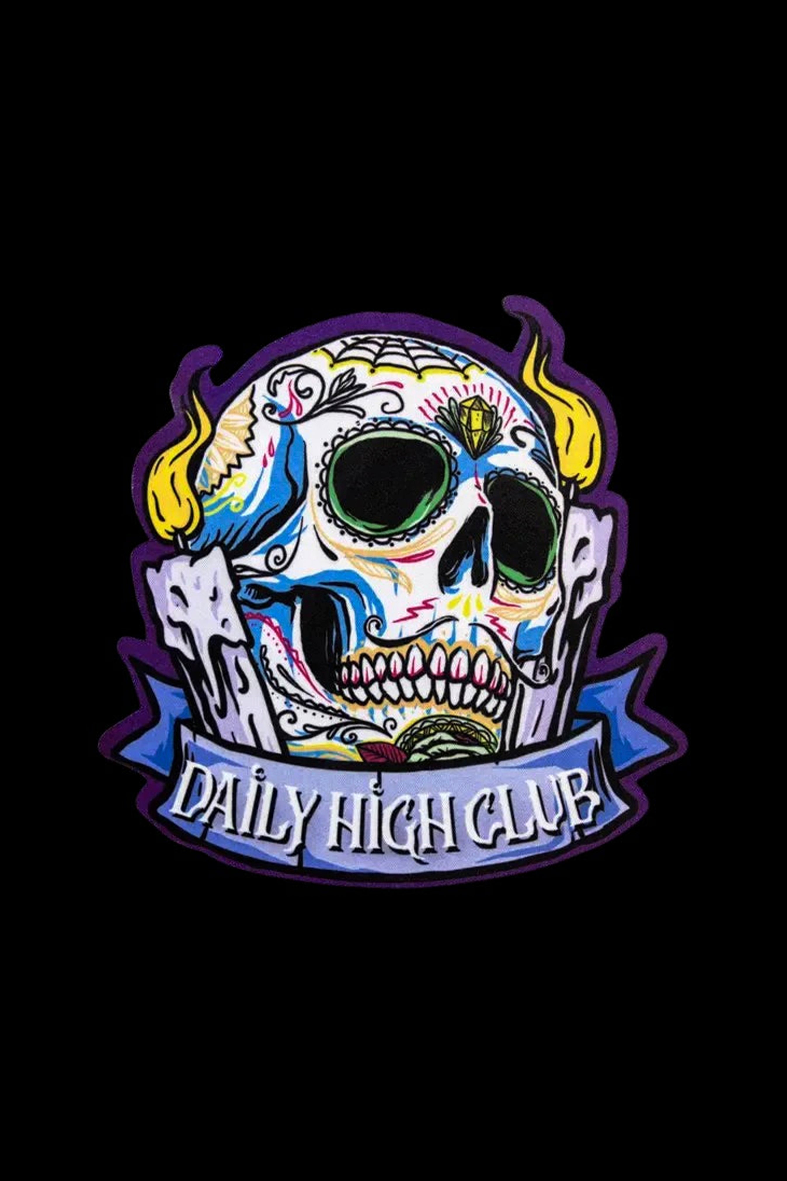 A colorful, ornate skull patch with “DAILY HIGH CLUB” banner, likely for cannabis-related merchandise.