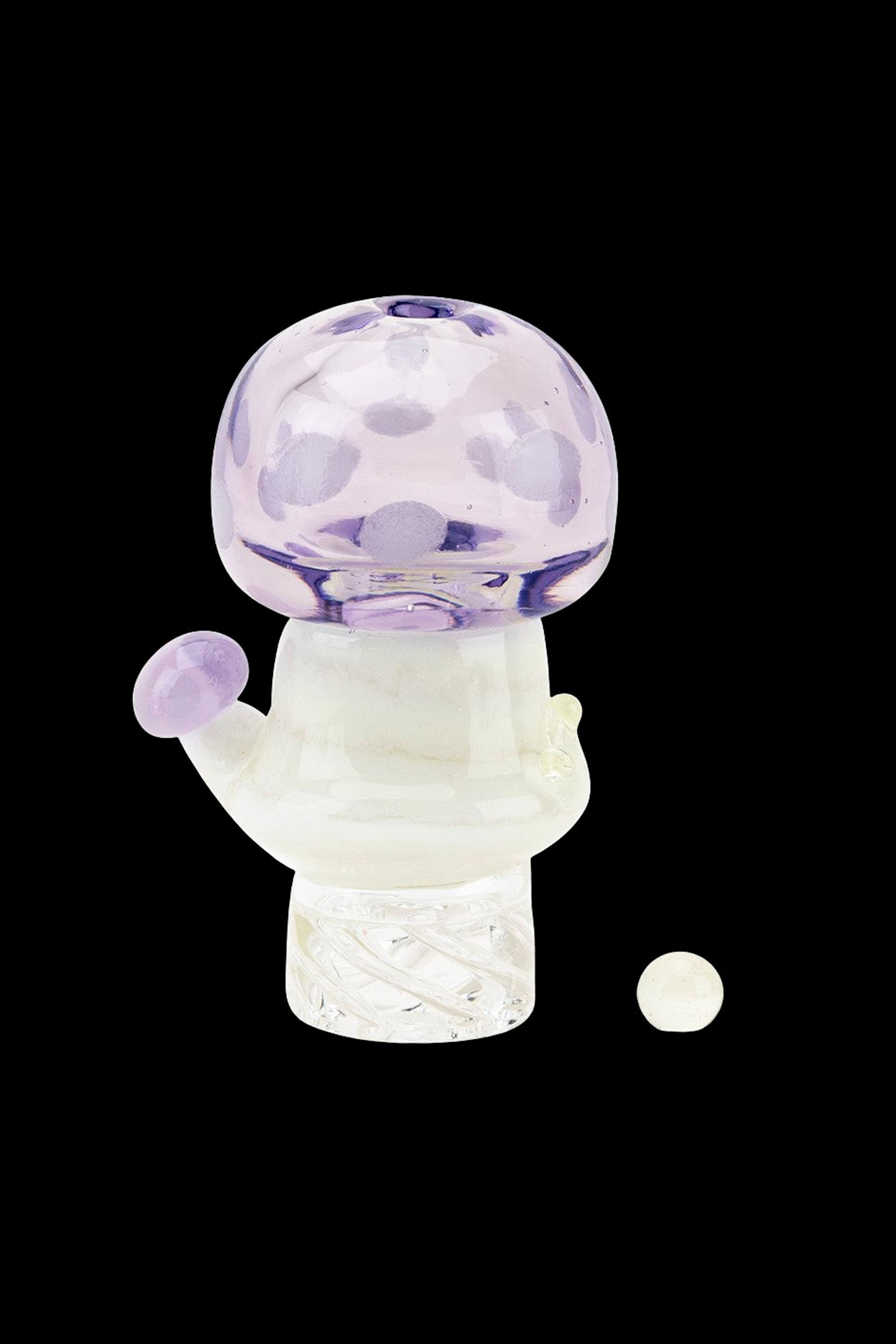 Lavender glass cannabis water pipe bubbler with speckled dome and small white bead beside it.