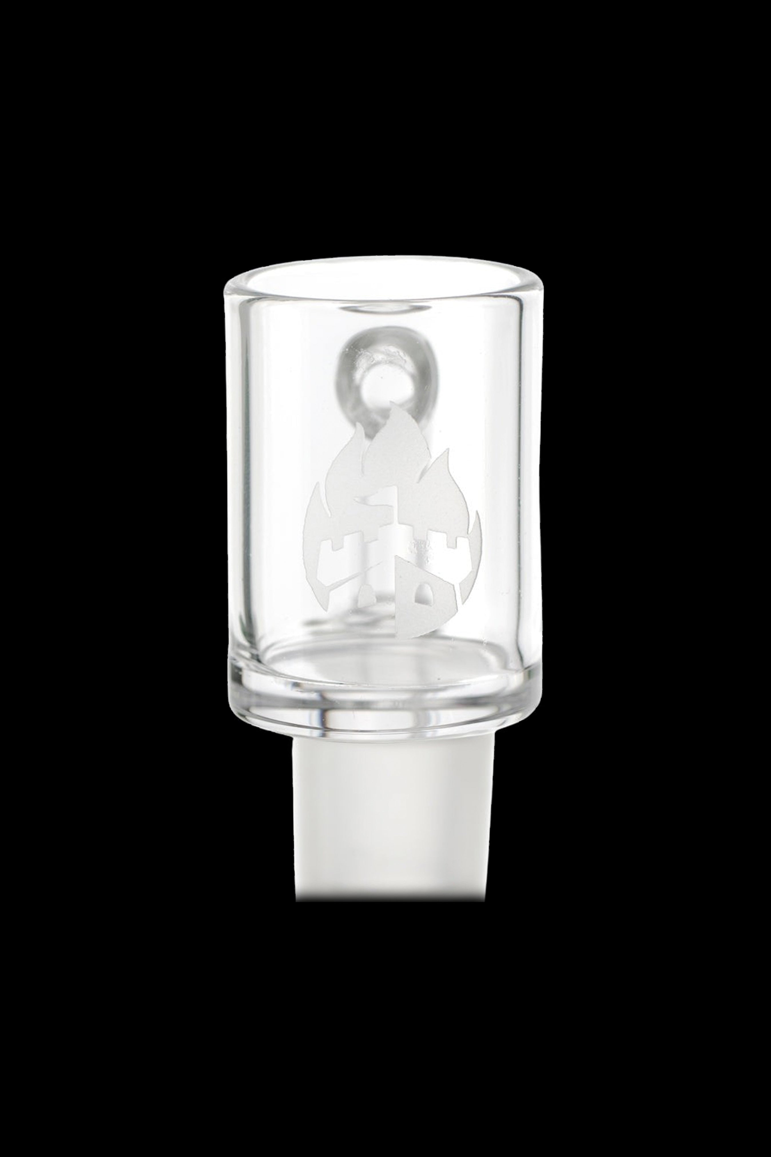 Clear glass terp pearl with a cityscape design inside, used for dabbing cannabis concentrates.