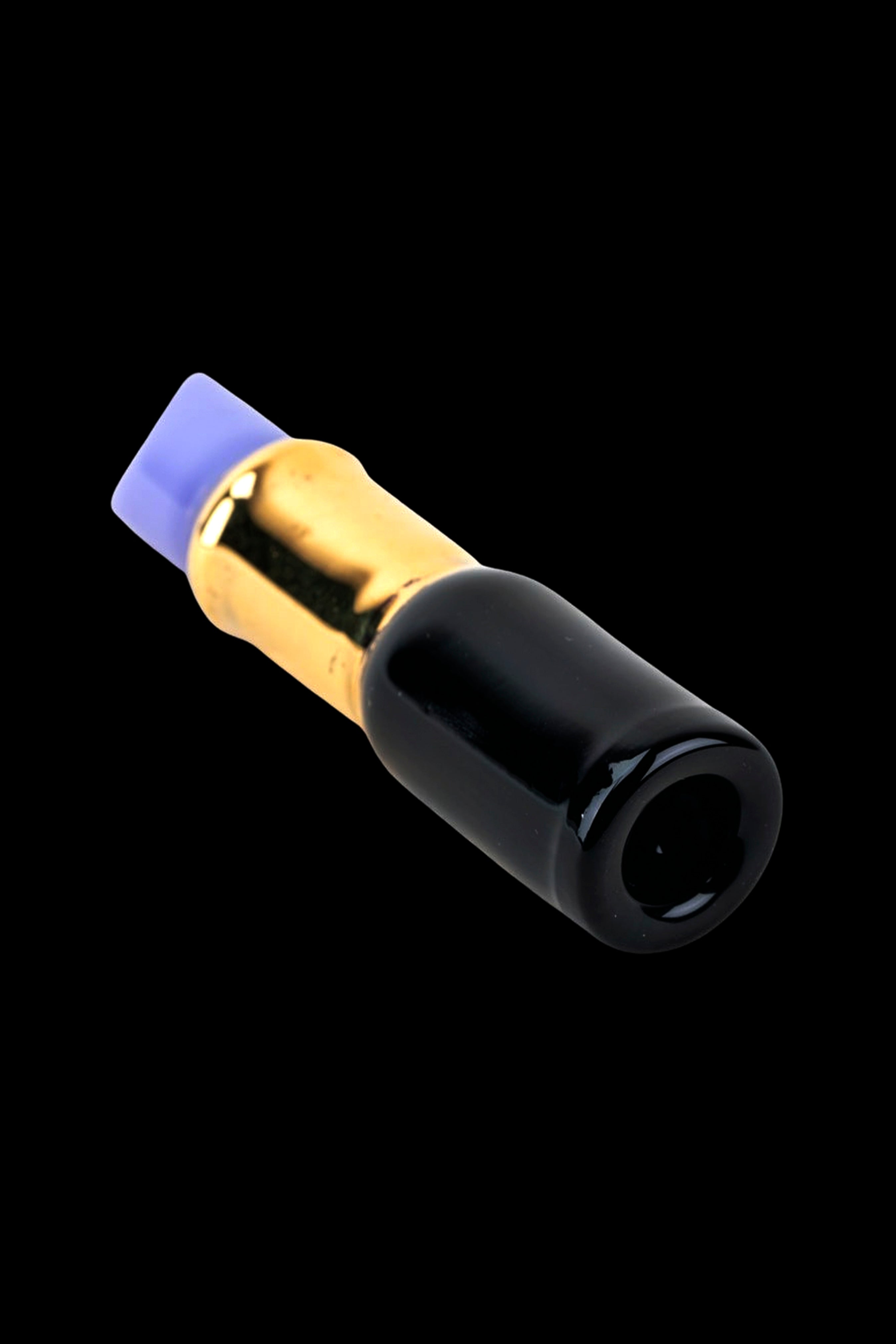 Glass cannabis oil burner pipe with blue and gold accents.