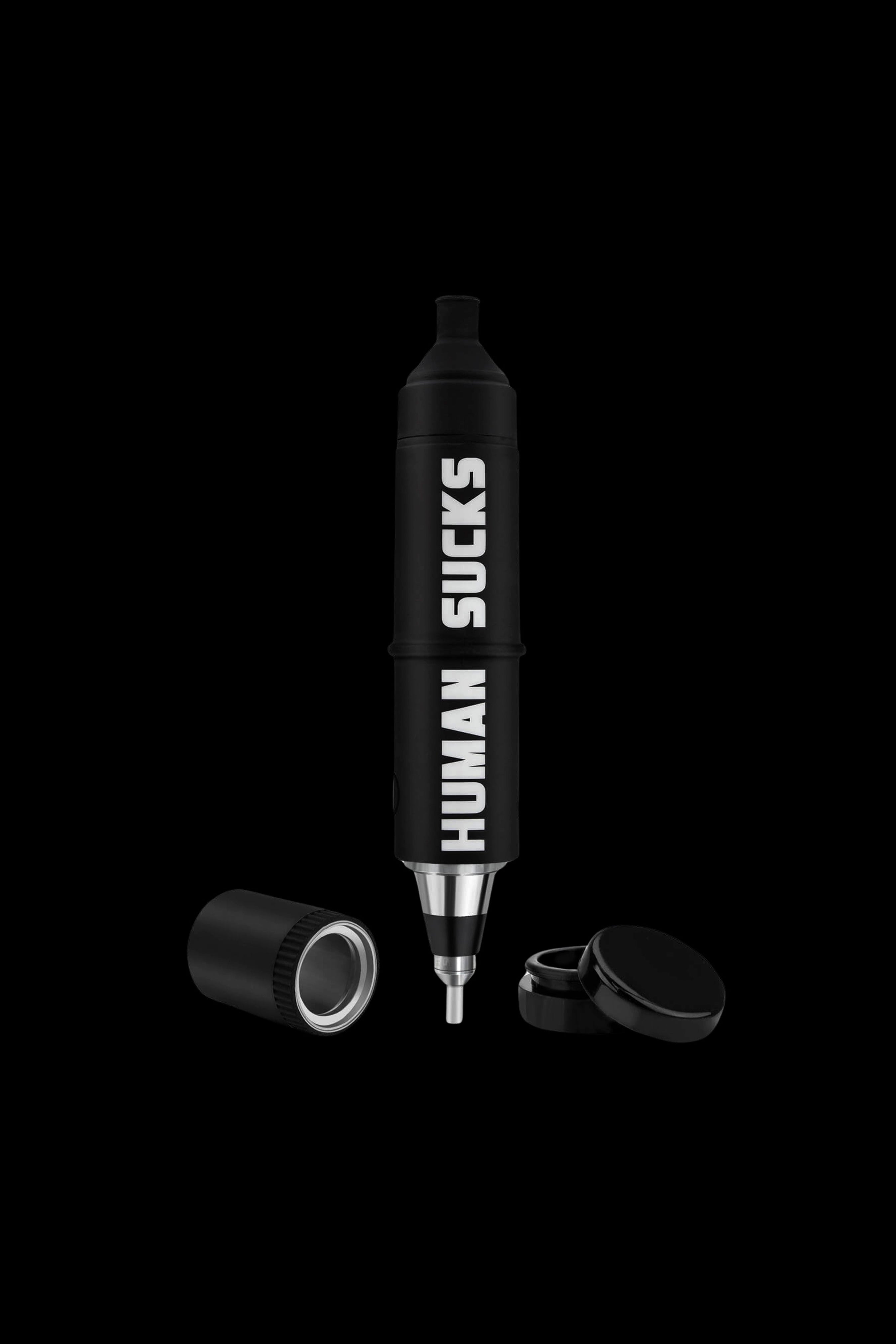 Black cannabis vaporizer pen with disassembled parts on a dark background, featuring the text "HUMAN SUCKS" vertically along the pen's body.