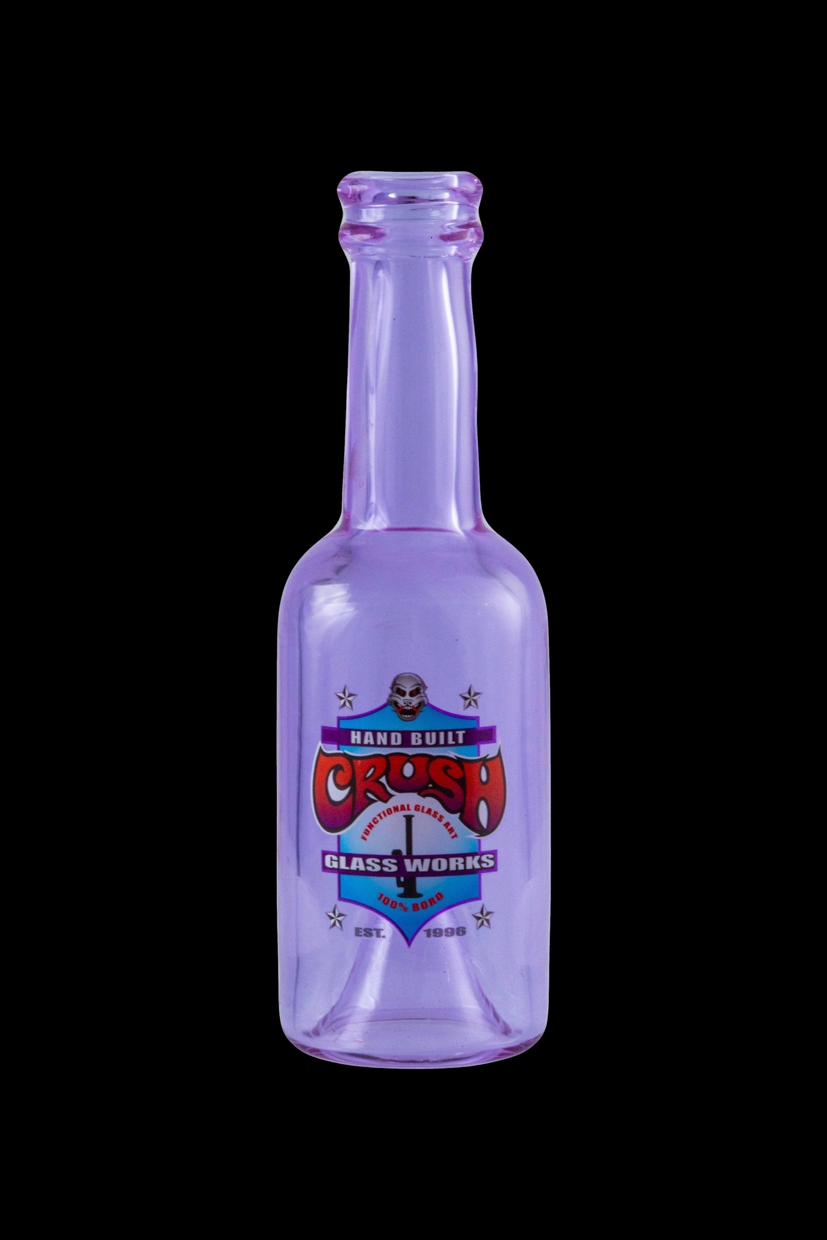 Purple glass bottle with "Crash Glass Works" label, likely for cannabis concentrates.