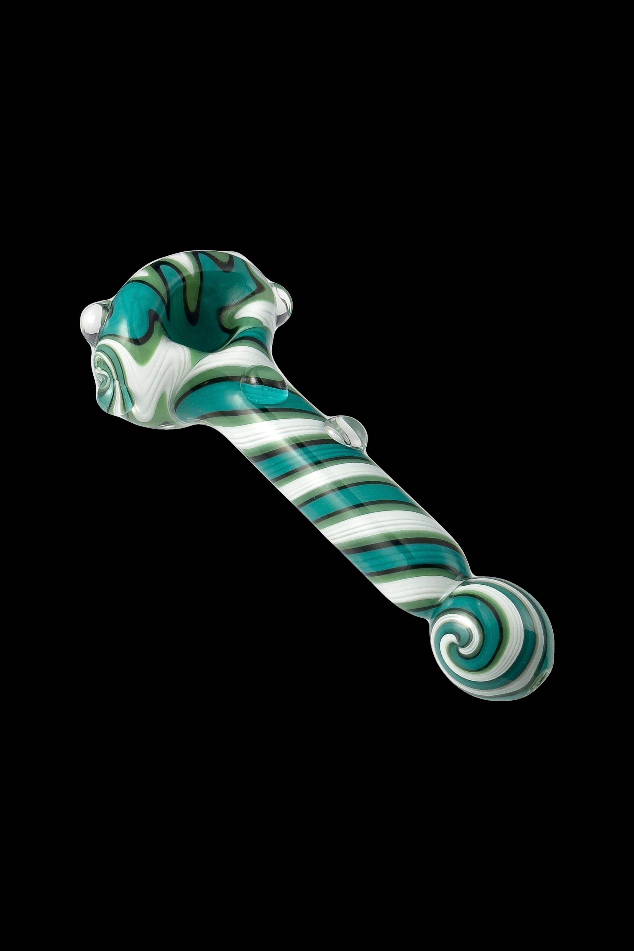 Hand-blown glass cannabis pipe with green and white swirl pattern.