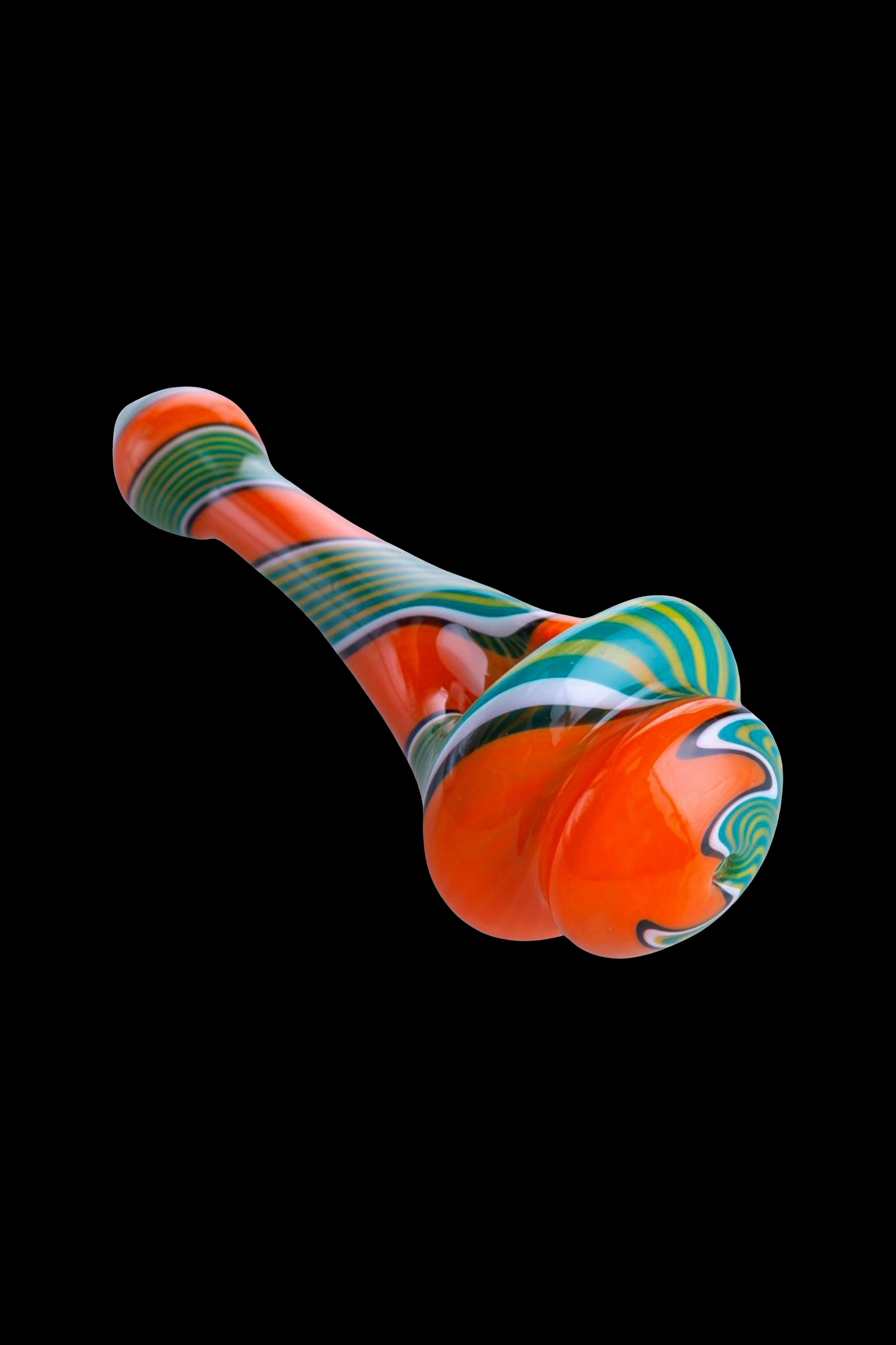 Handblown glass cannabis water pipe with orange and teal swirls.