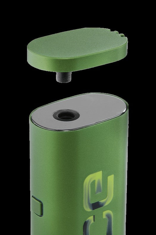 Green cannabis vaporizer with open lid.
