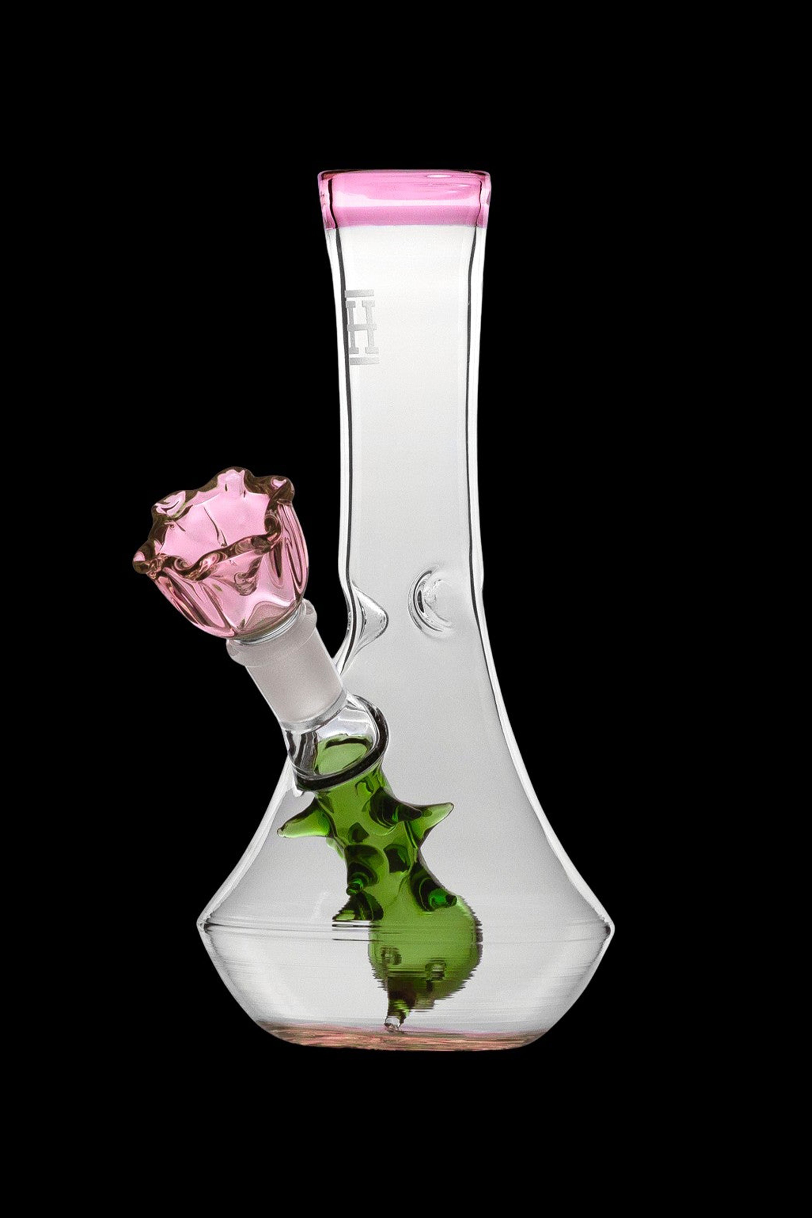 Glass bong shaped like a flower with pink accents.