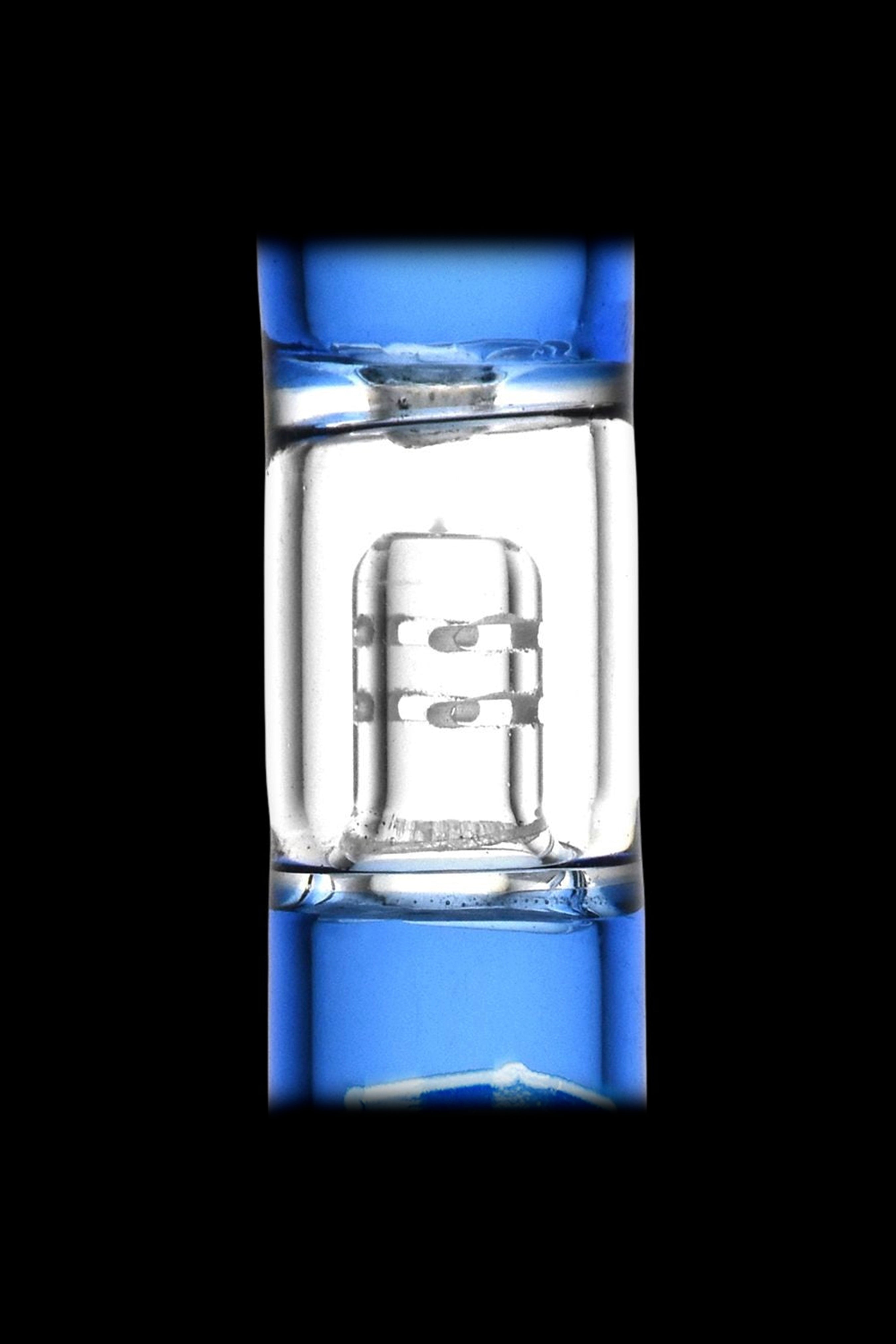 Blue glass dab rig with quartz banger.