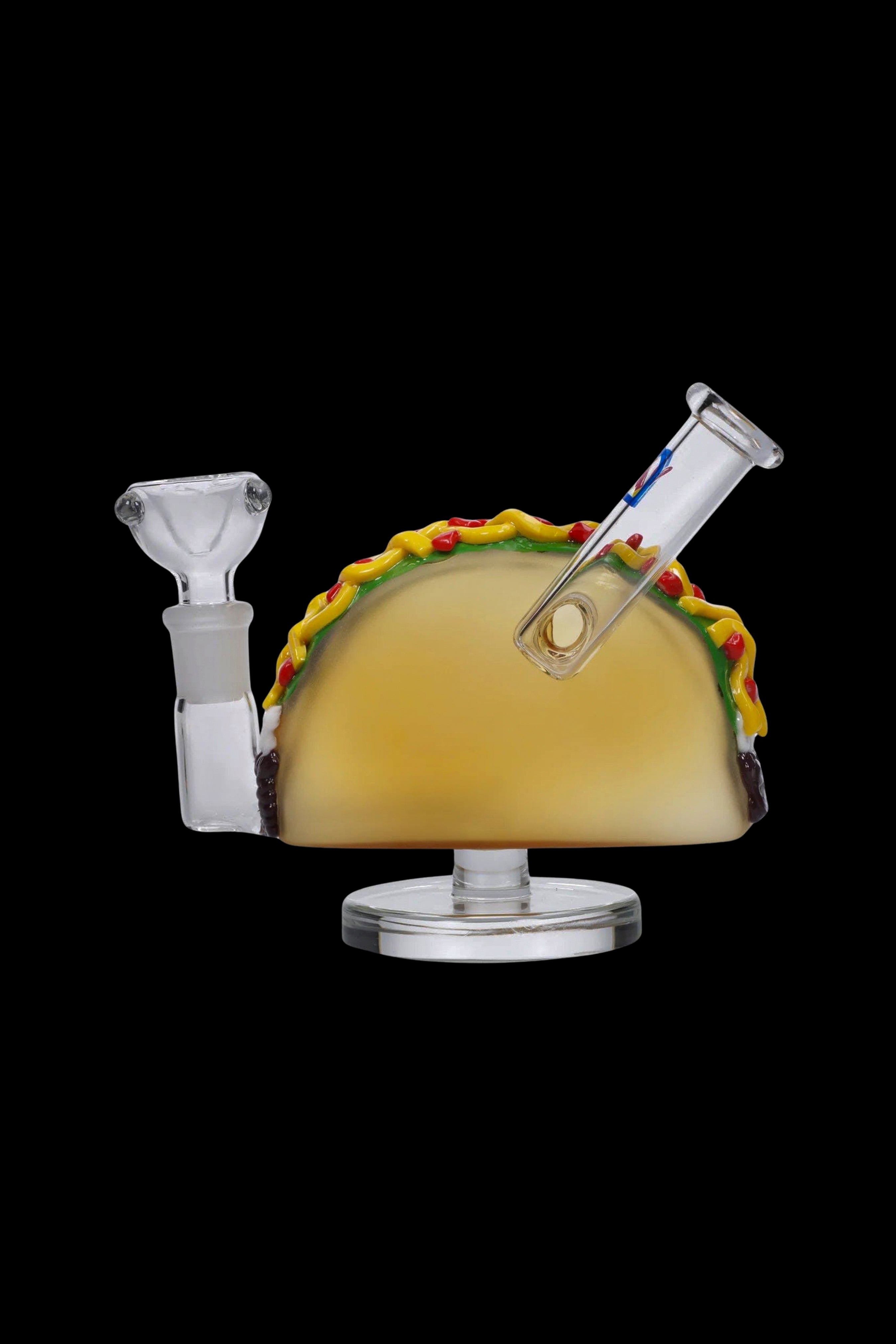 Glass taco-shaped water pipe for cannabis use.