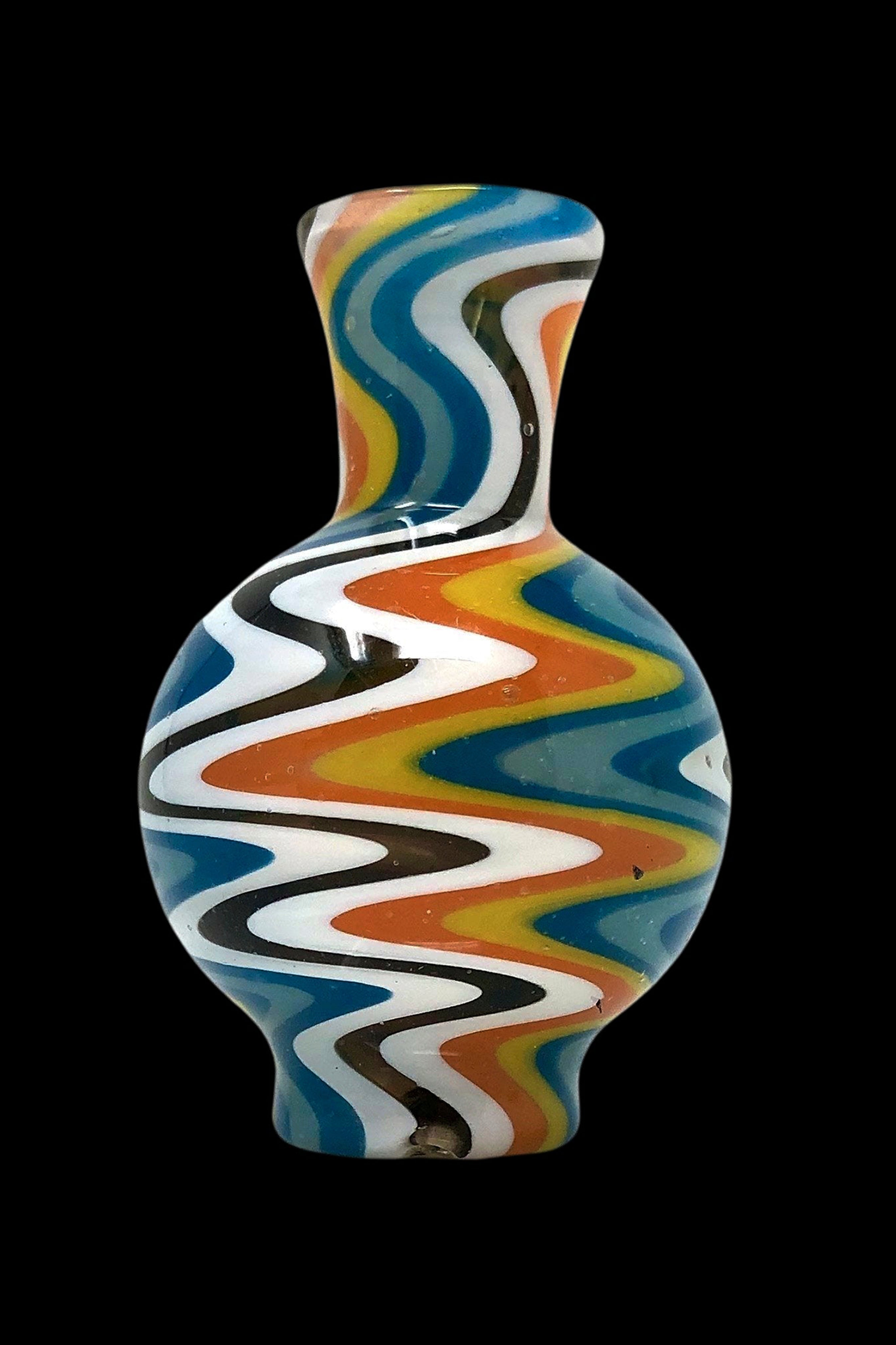 Colorful glass water pipe with swirling orange, blue, and white patterns.