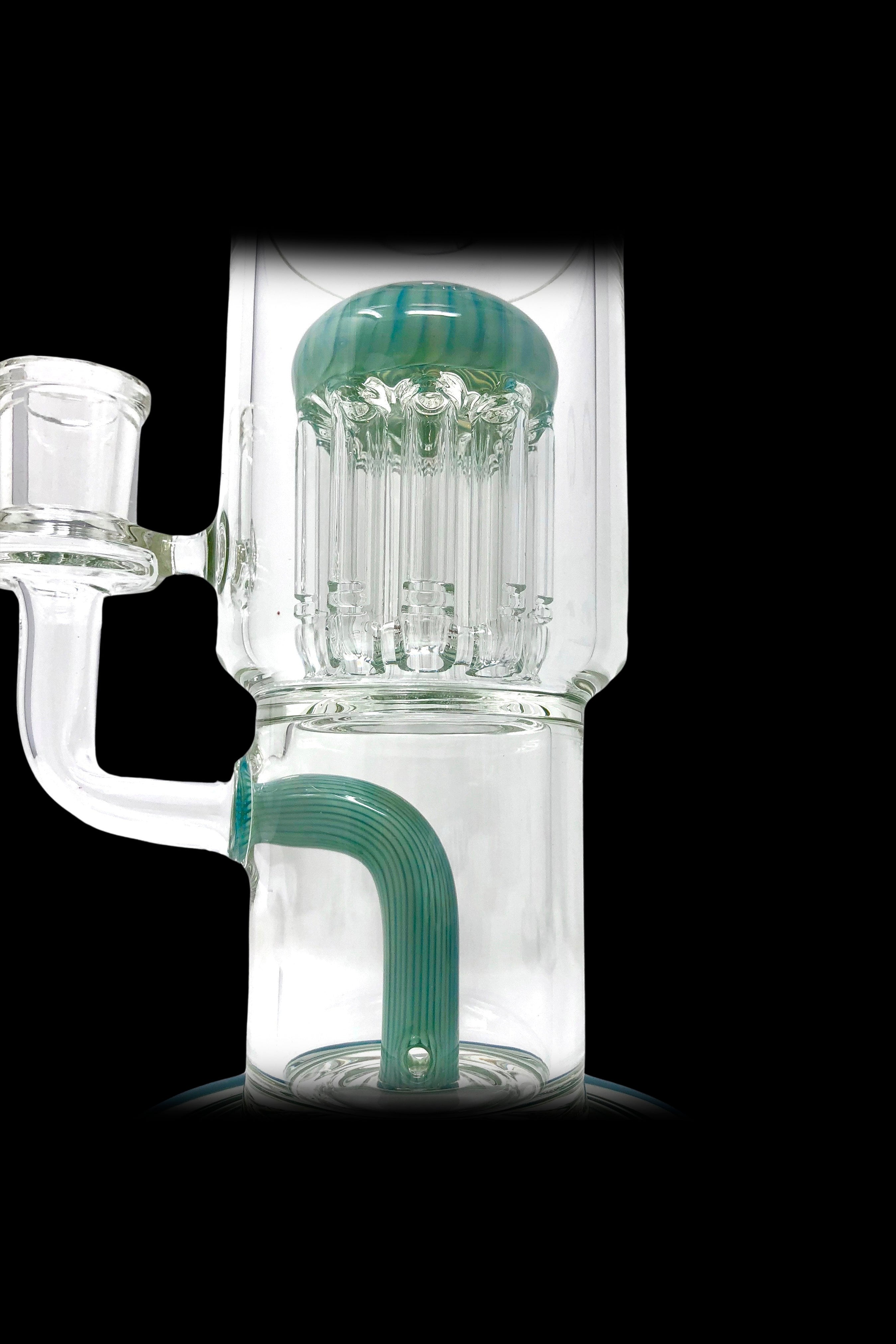 Green and clear glass water pipe with intricate percolator filtration system.