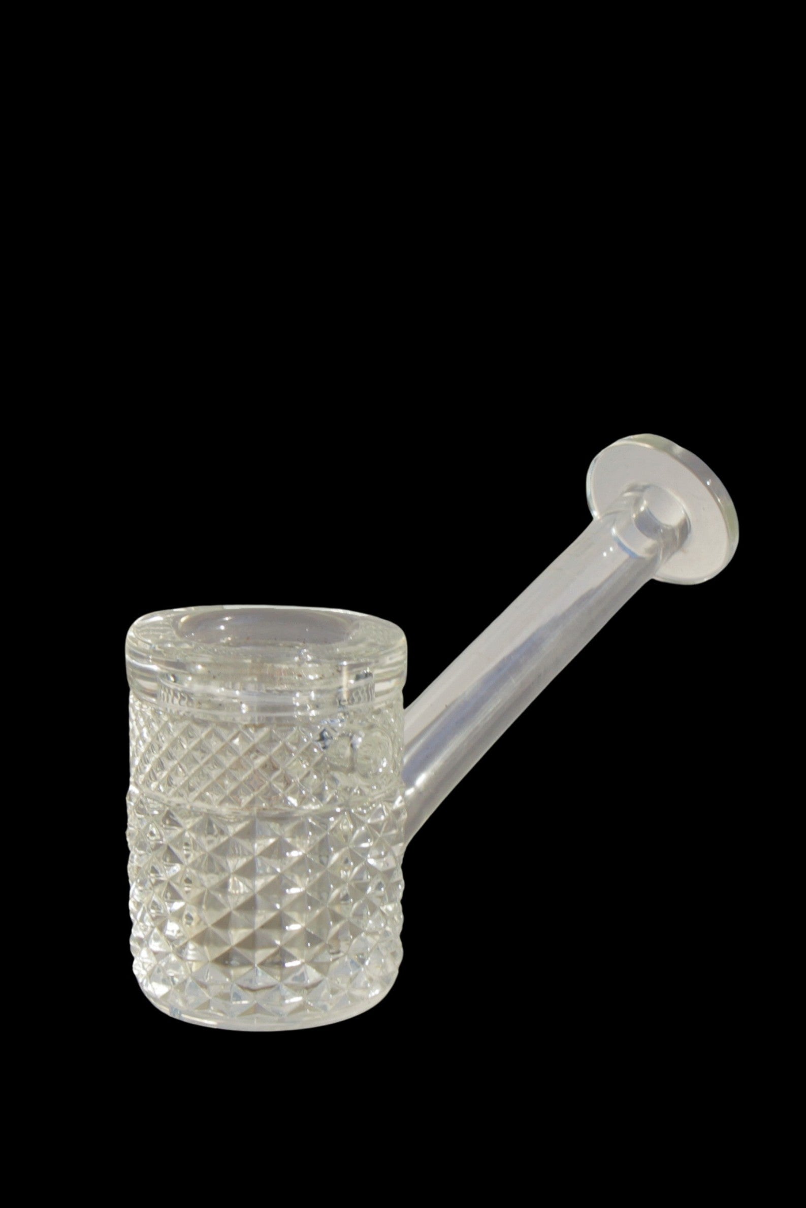 Clear glass bubbler with textured body and mouthpiece.