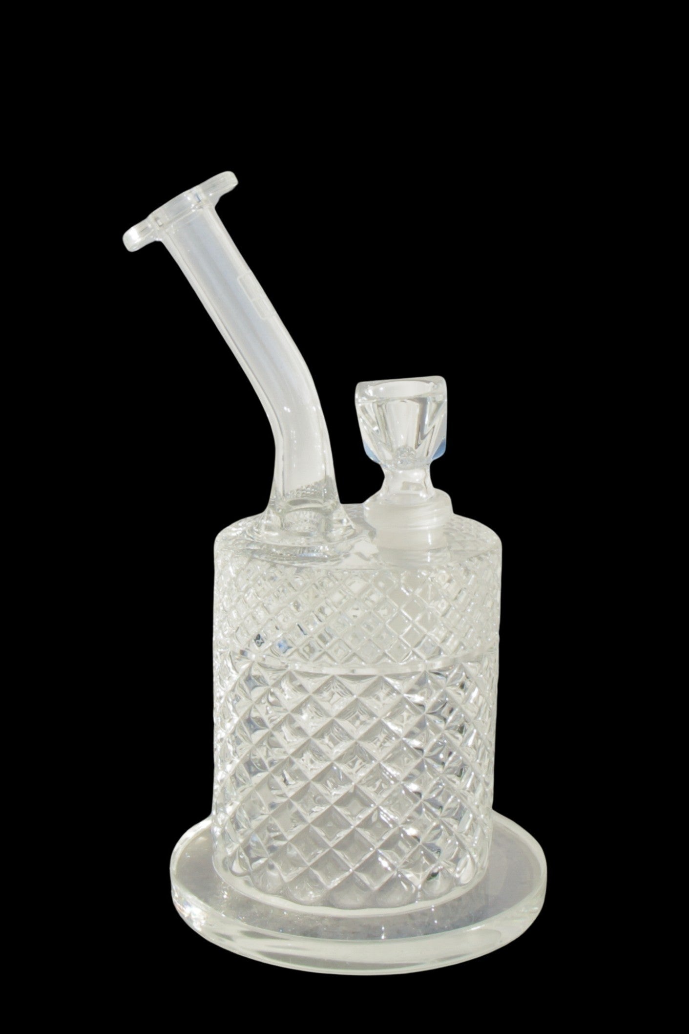 Clear glass water pipe with diamond-patterned body and flared base, isolated on a black background.
