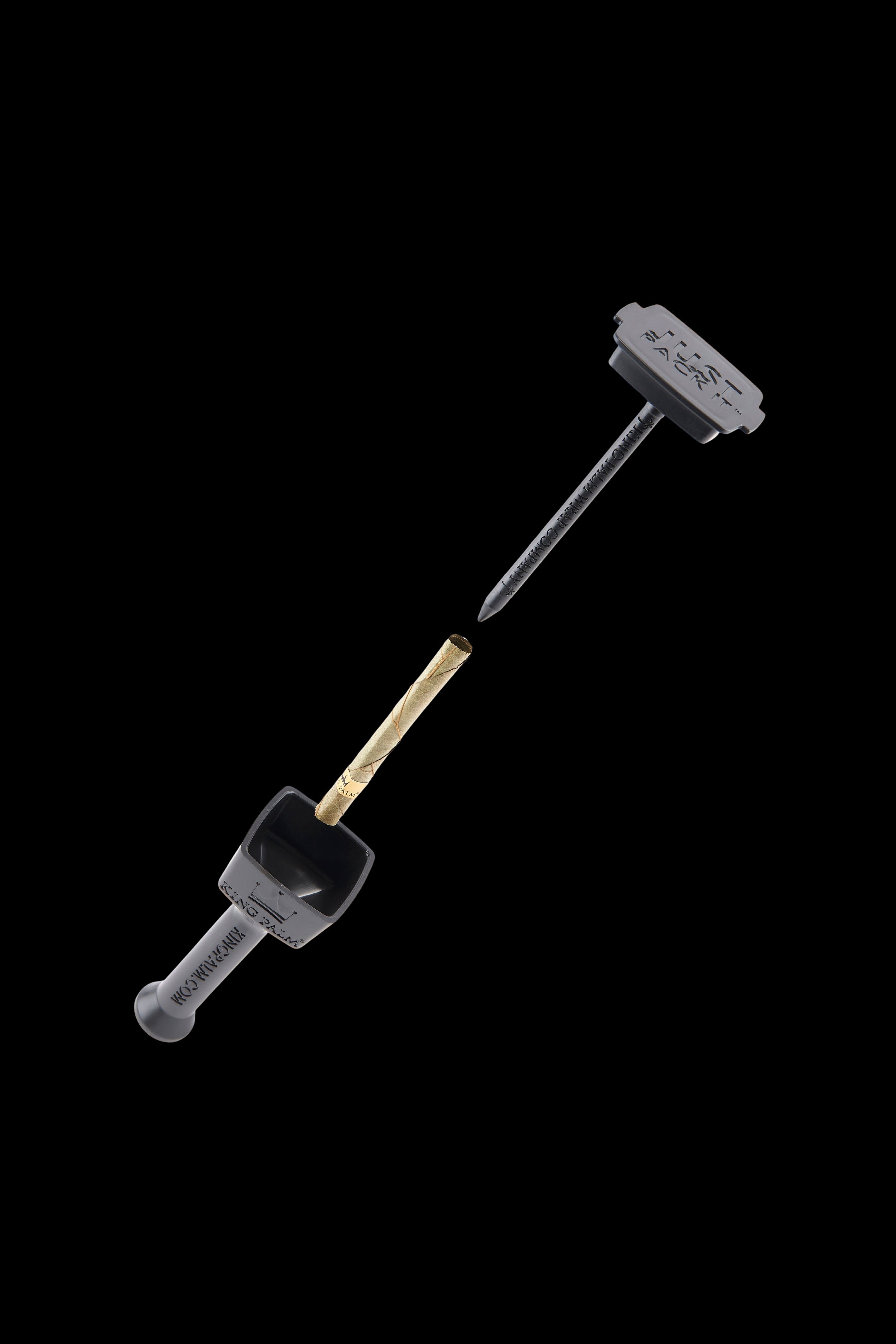 Black cannabis dab tool with a lit joint.