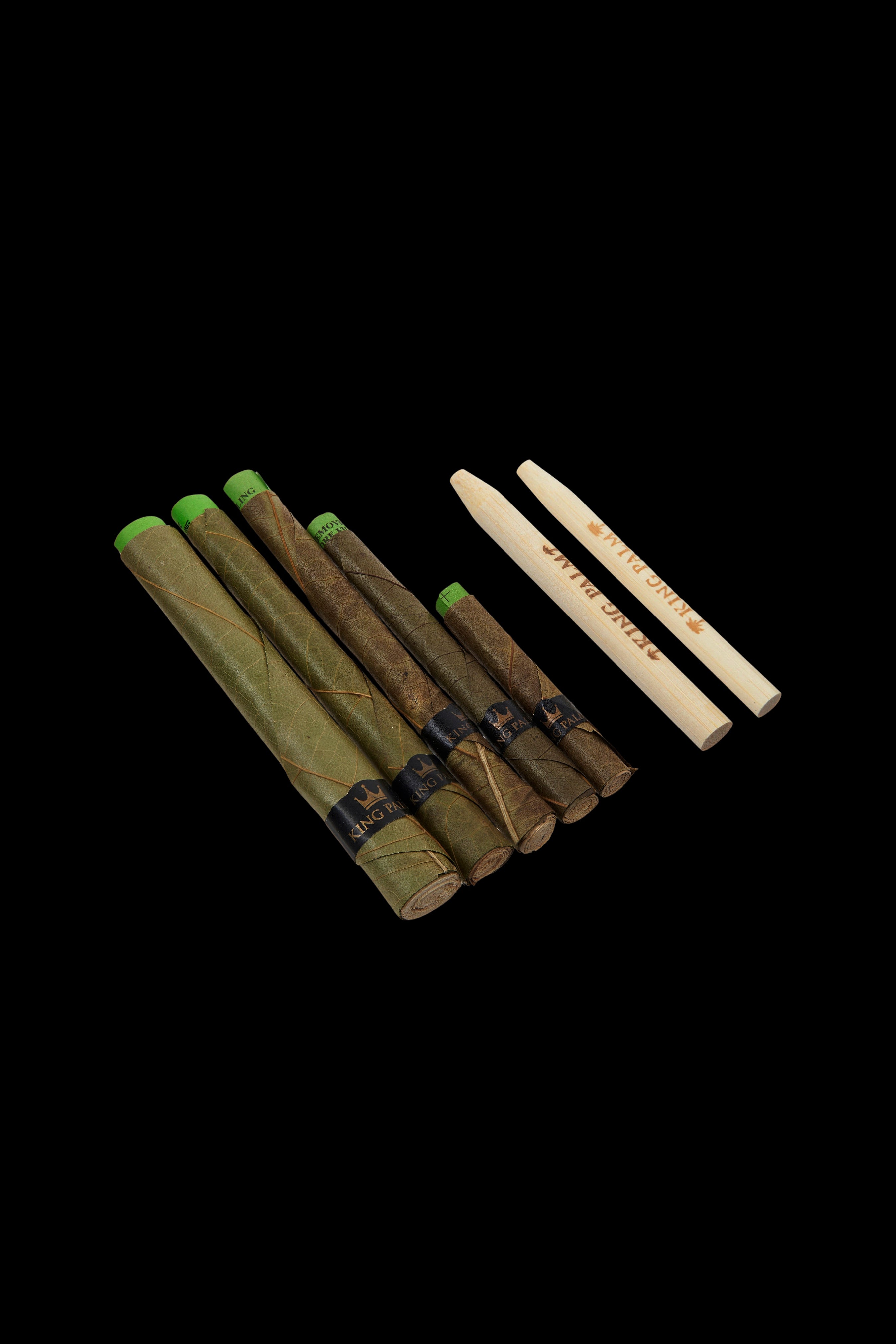 Pre-rolled cannabis joints with branded packaging against a dark background.
