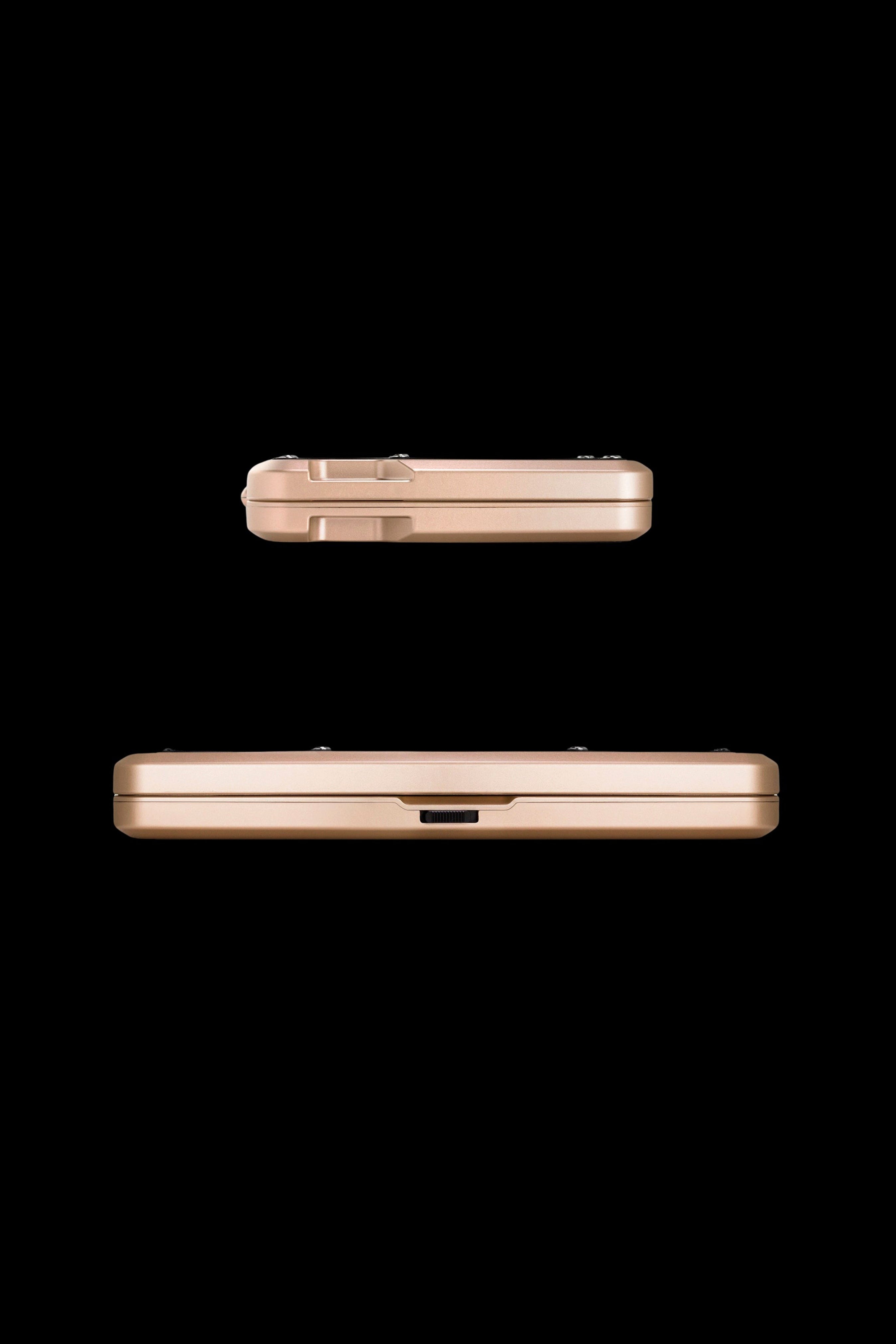 Gold cannabis storage case, shown from side and top views.