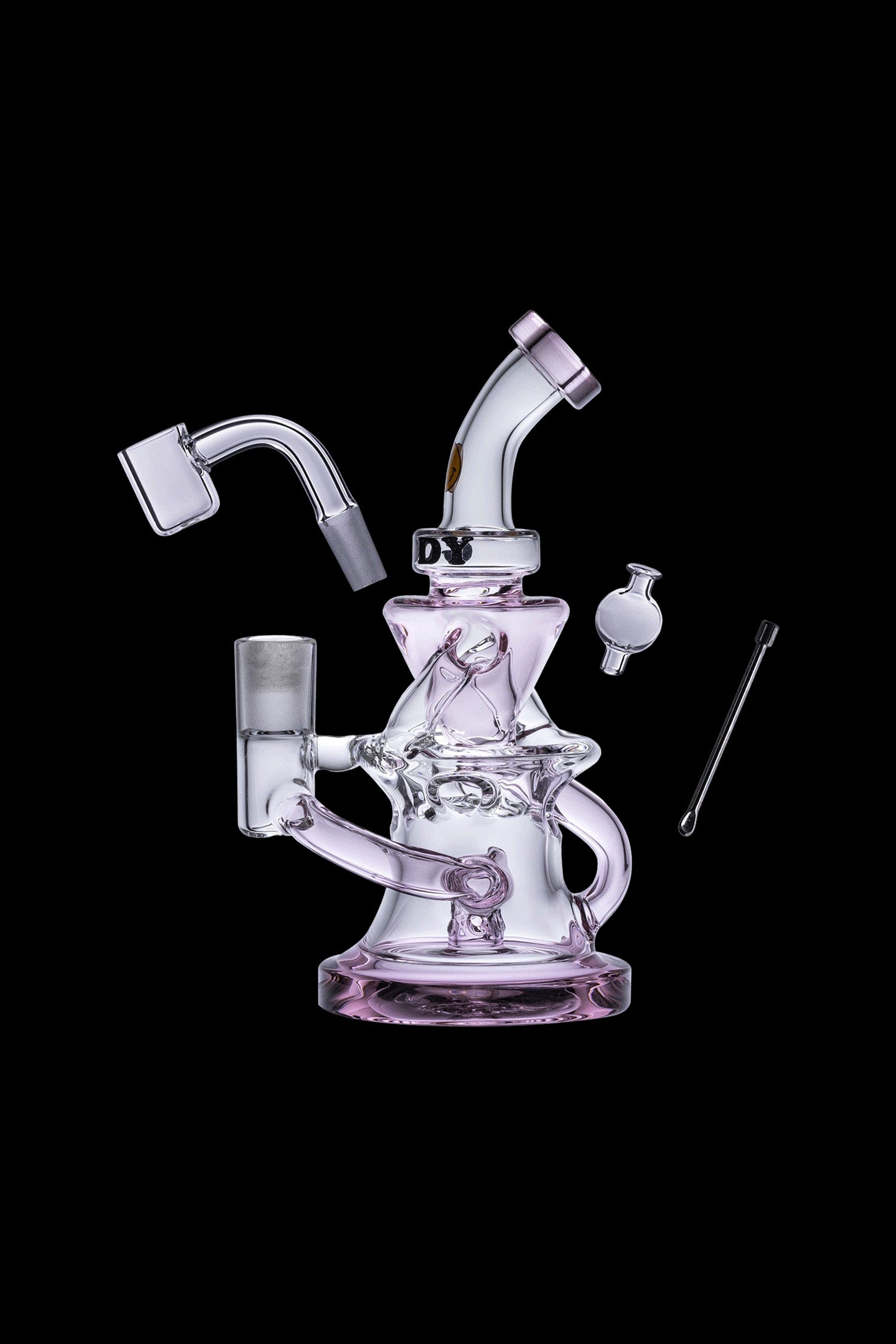 Pink glass dab rig with accessories on a black background.