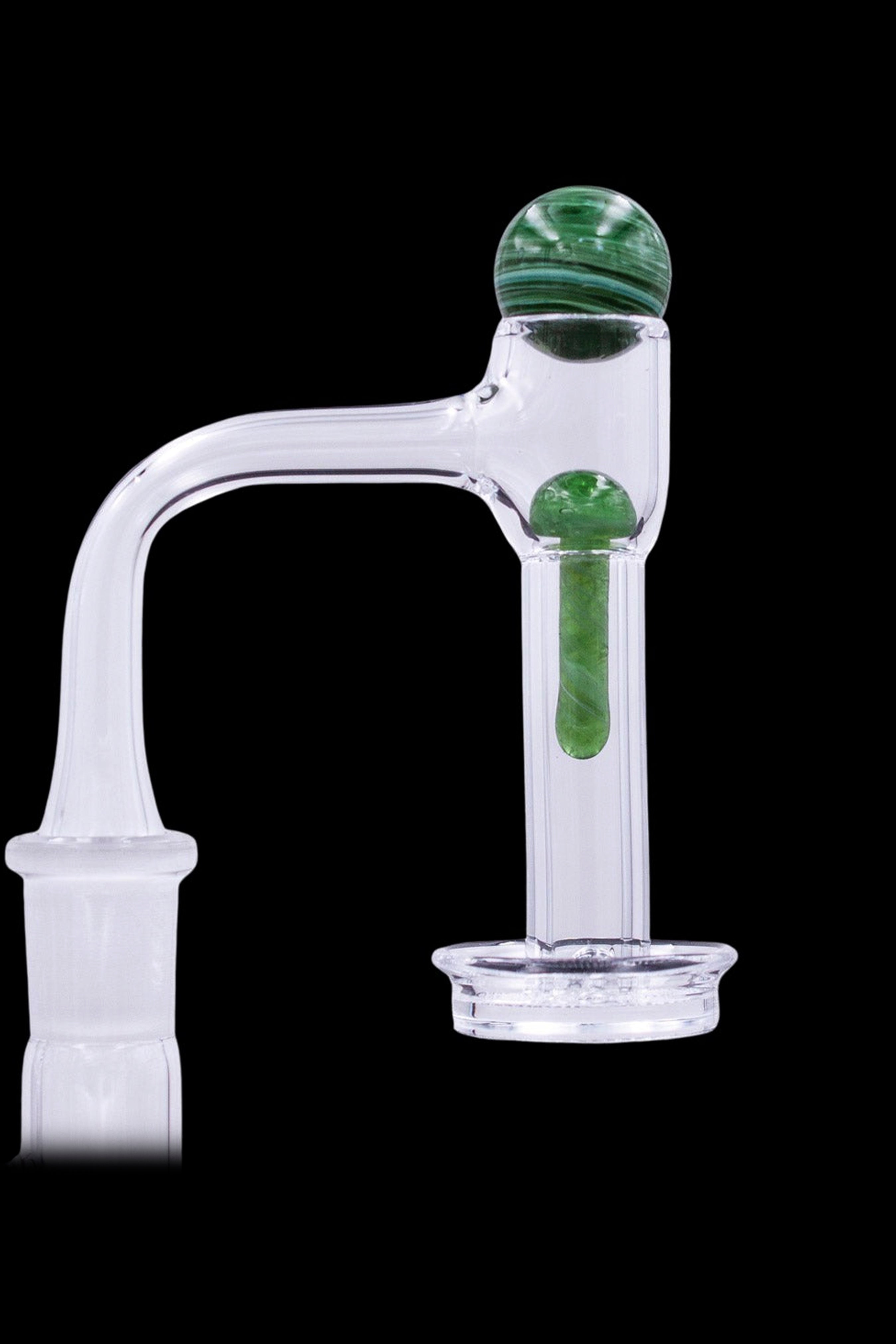 Green glass bubbler for cannabis concentrate use.
