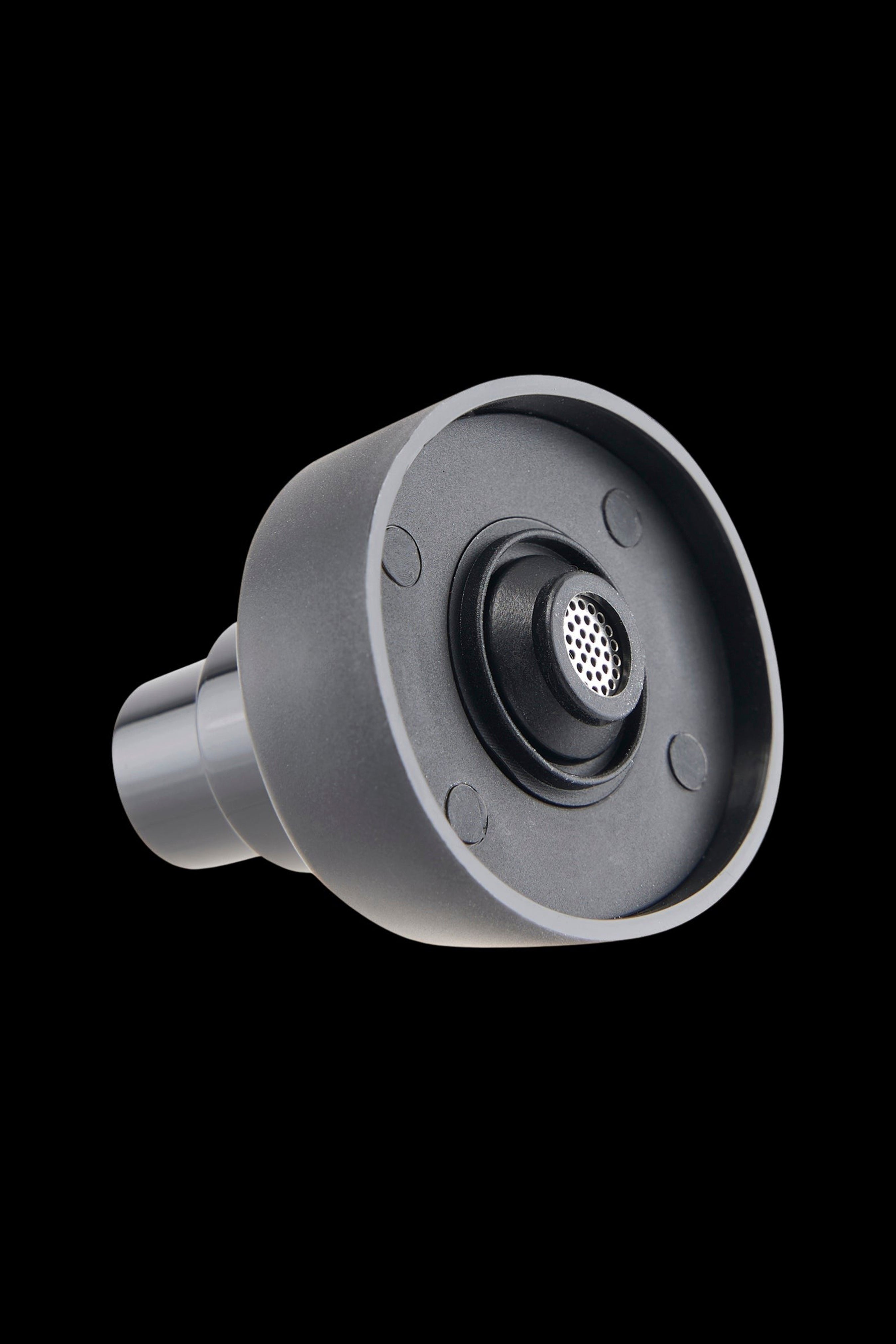 Black cannabis concentrate vaporizer coil with a perforated intake.