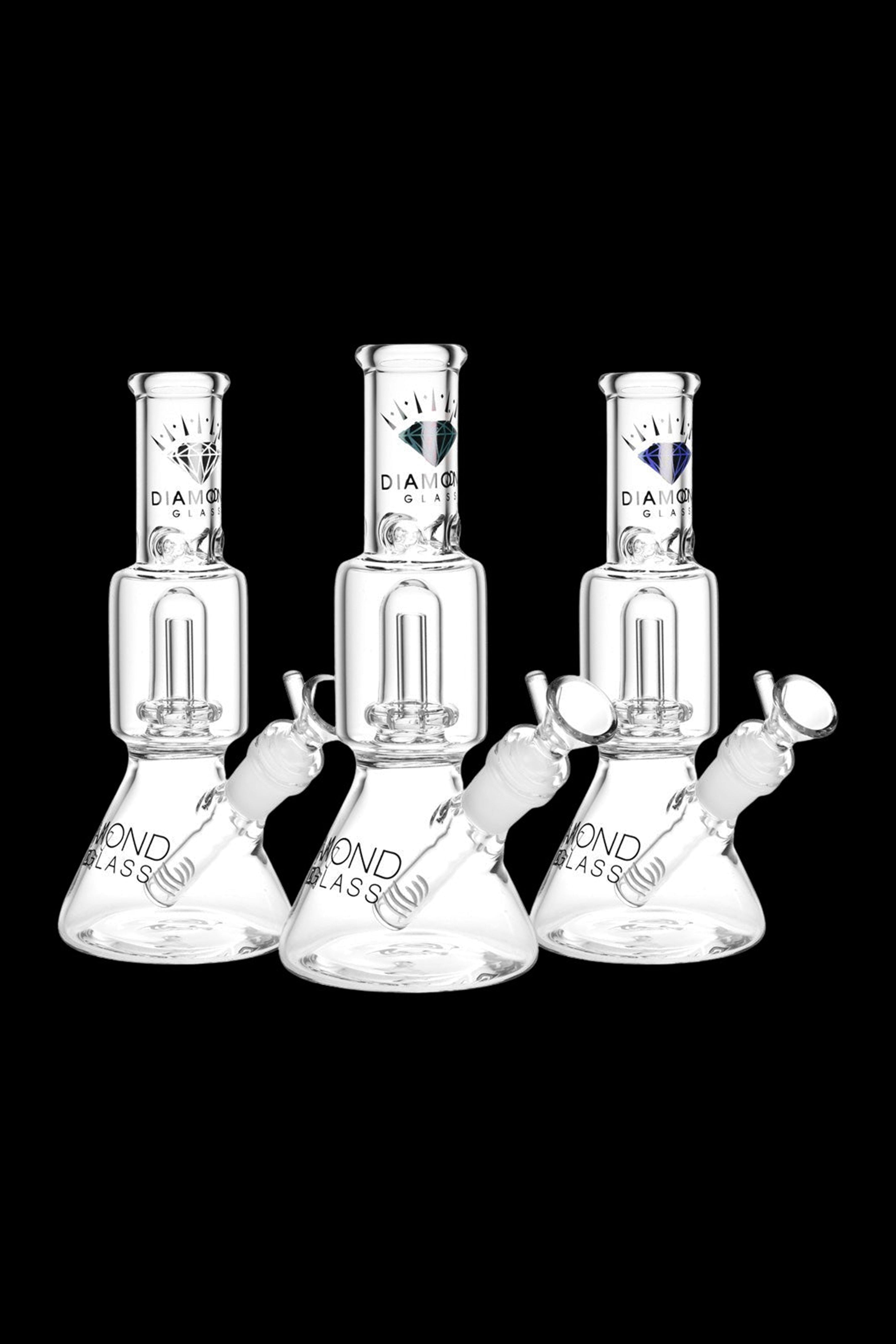 Three clear glass bubblers with ice pinches and branded bases against a black background.