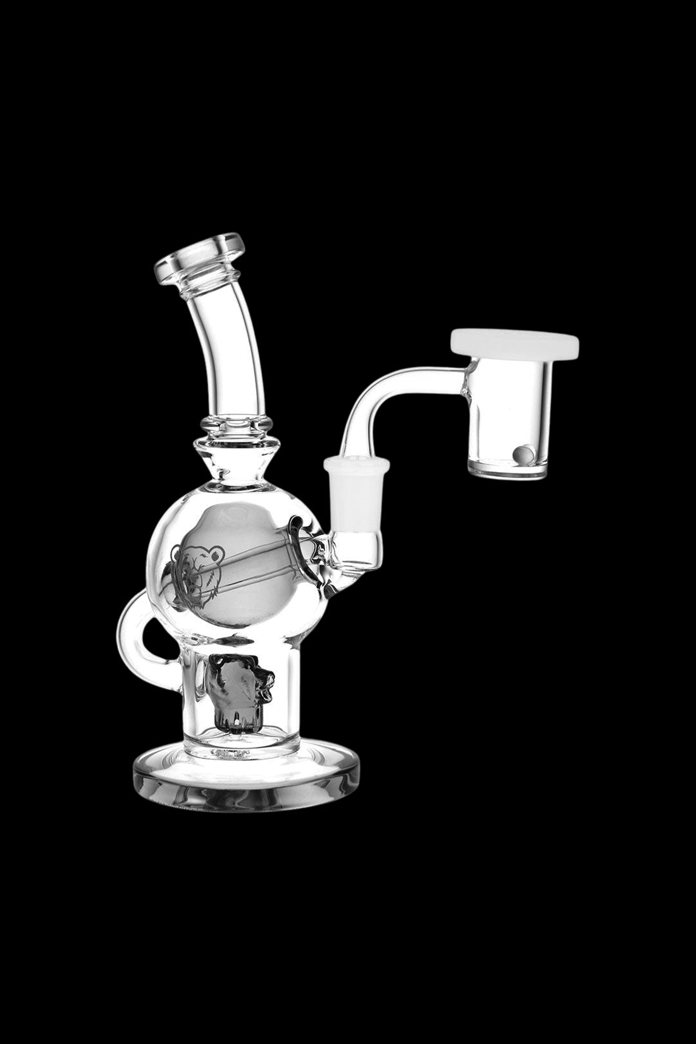Clear glass dab rig with a spherical chamber and quartz banger.