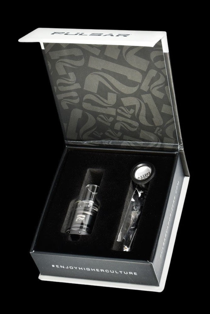 Open black box displaying a cannabis oil burner and accessories, branded with "#ENJOYHIGHERCULTURE".